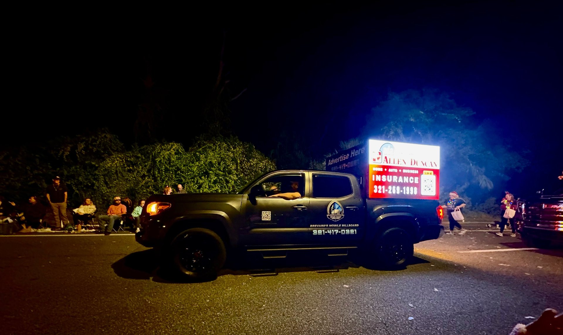 turned-on high-rise building monitor