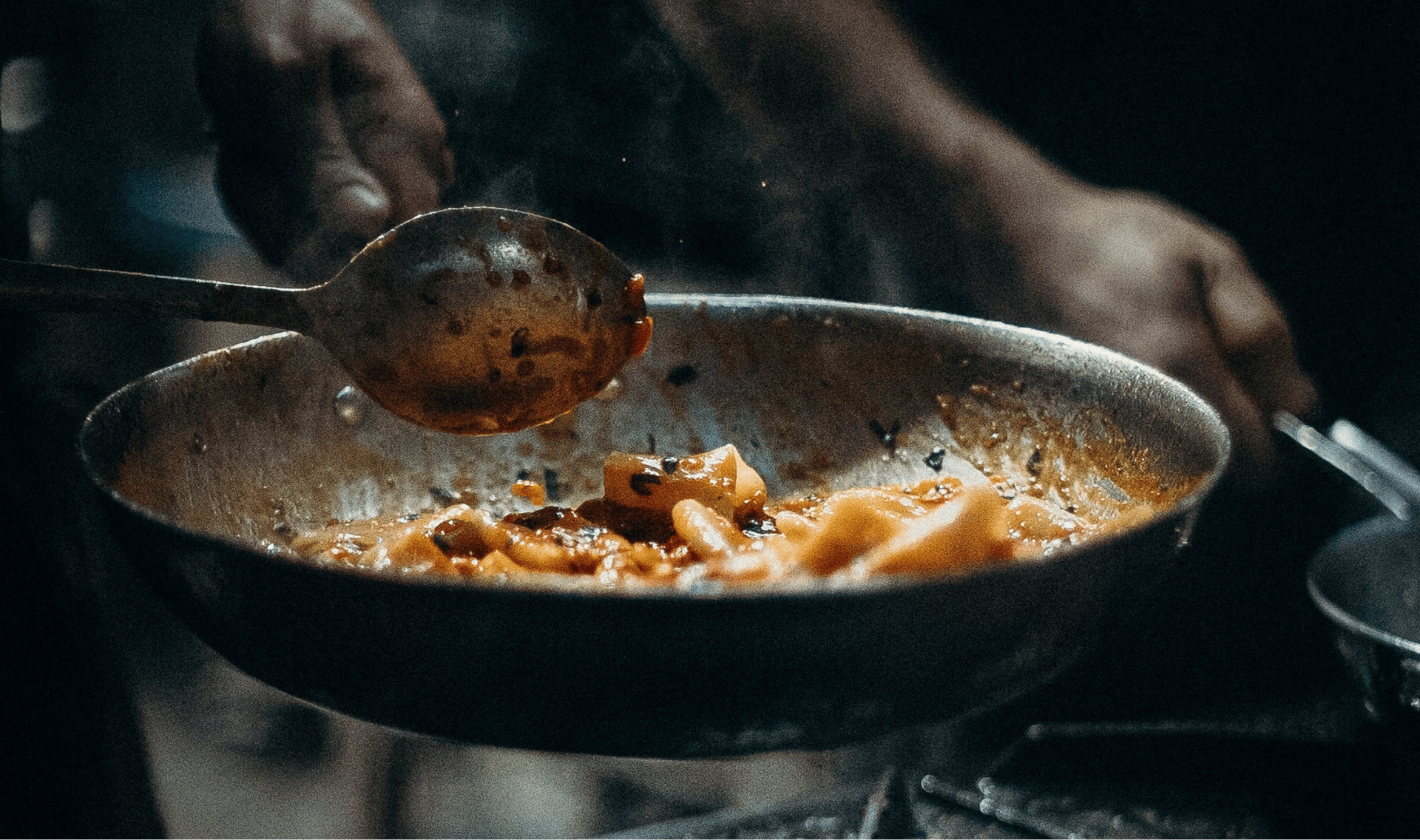 an abstract photo of a curved building with a blue sky in the background