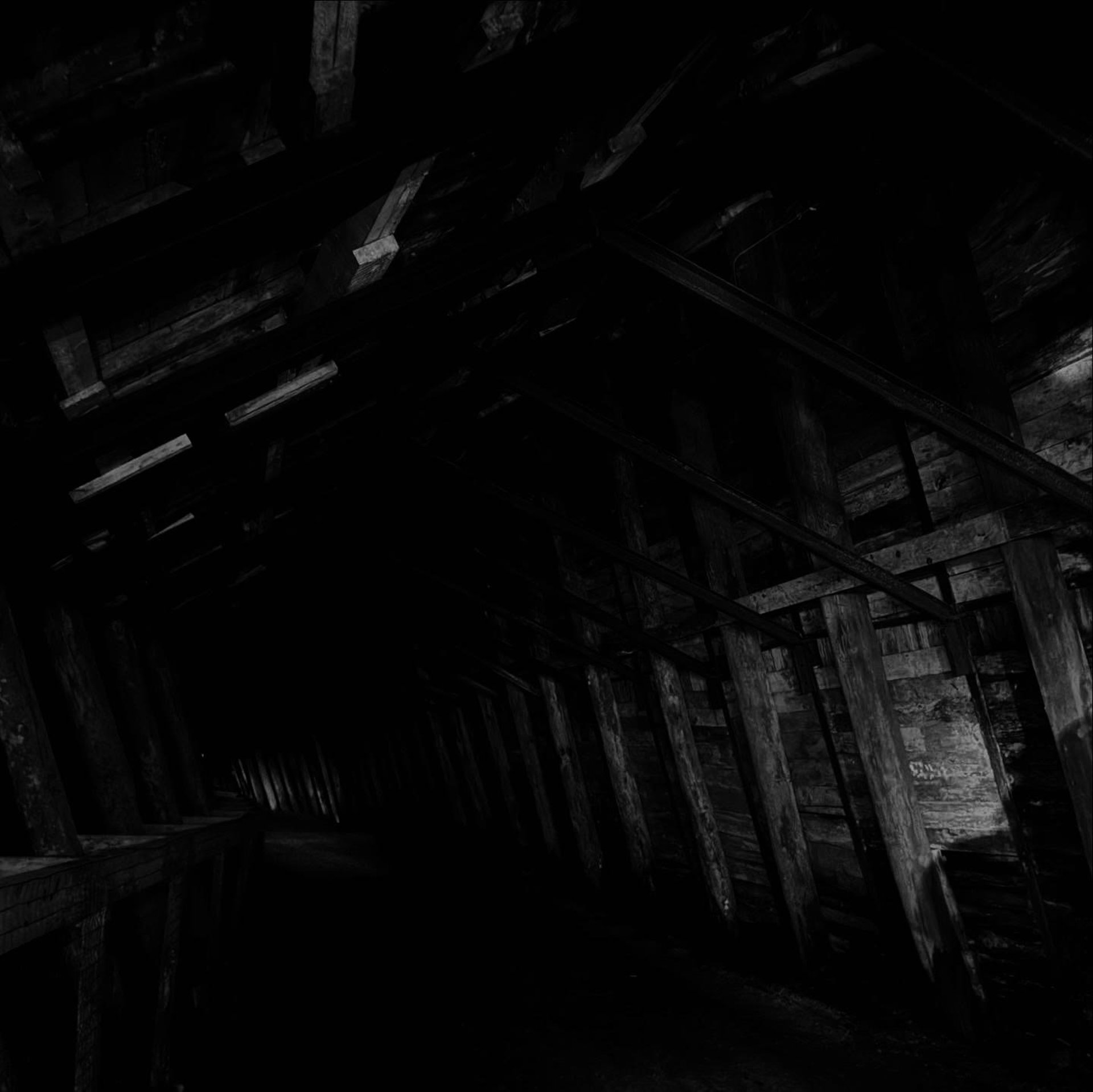 black and brown leather padded tub sofa