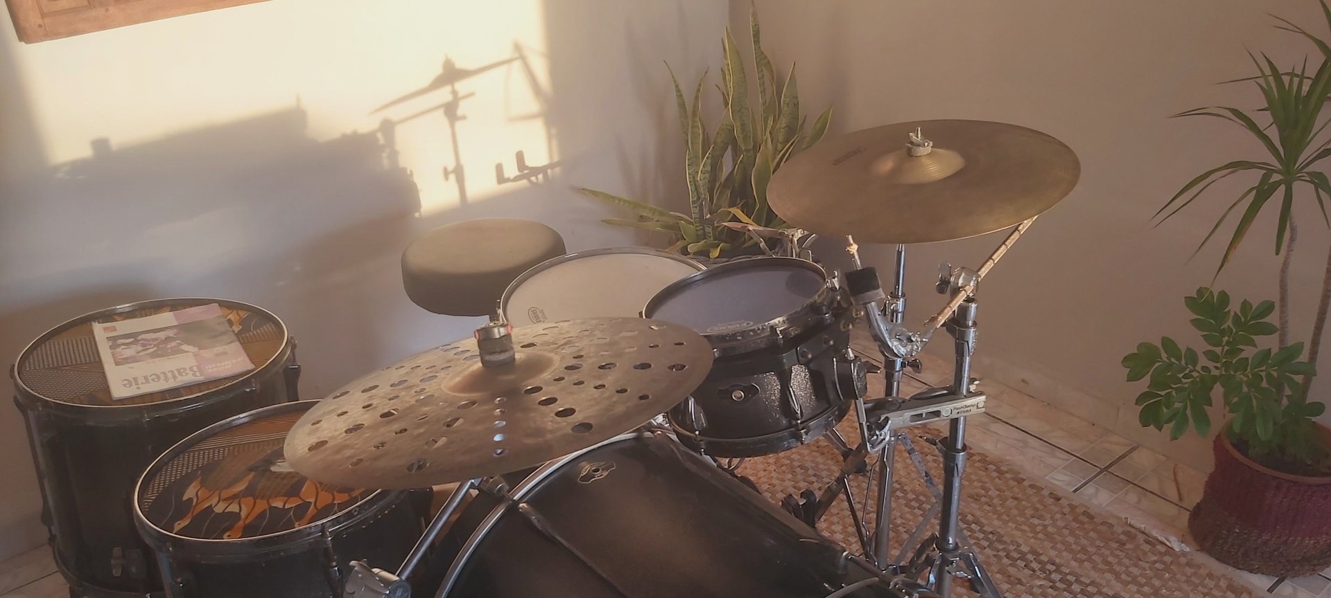 grayscale photo of man playing guitar
