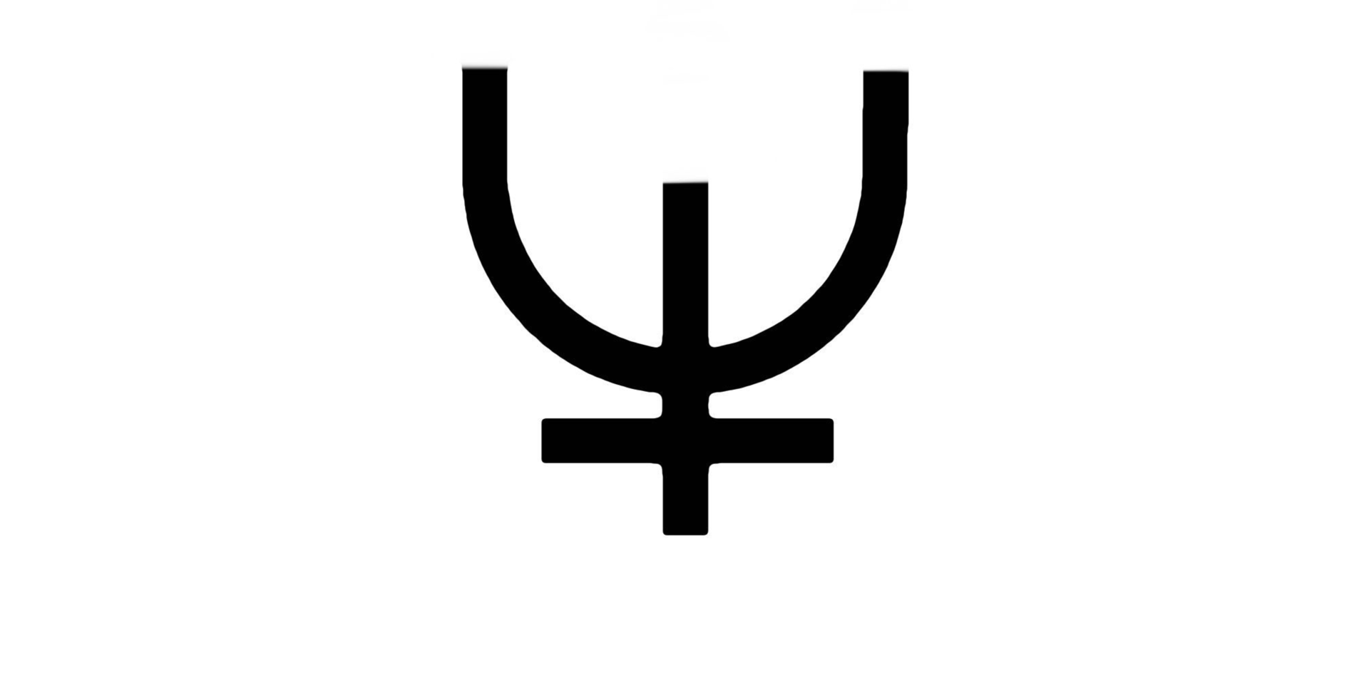 a white and brown wall with a clock on it