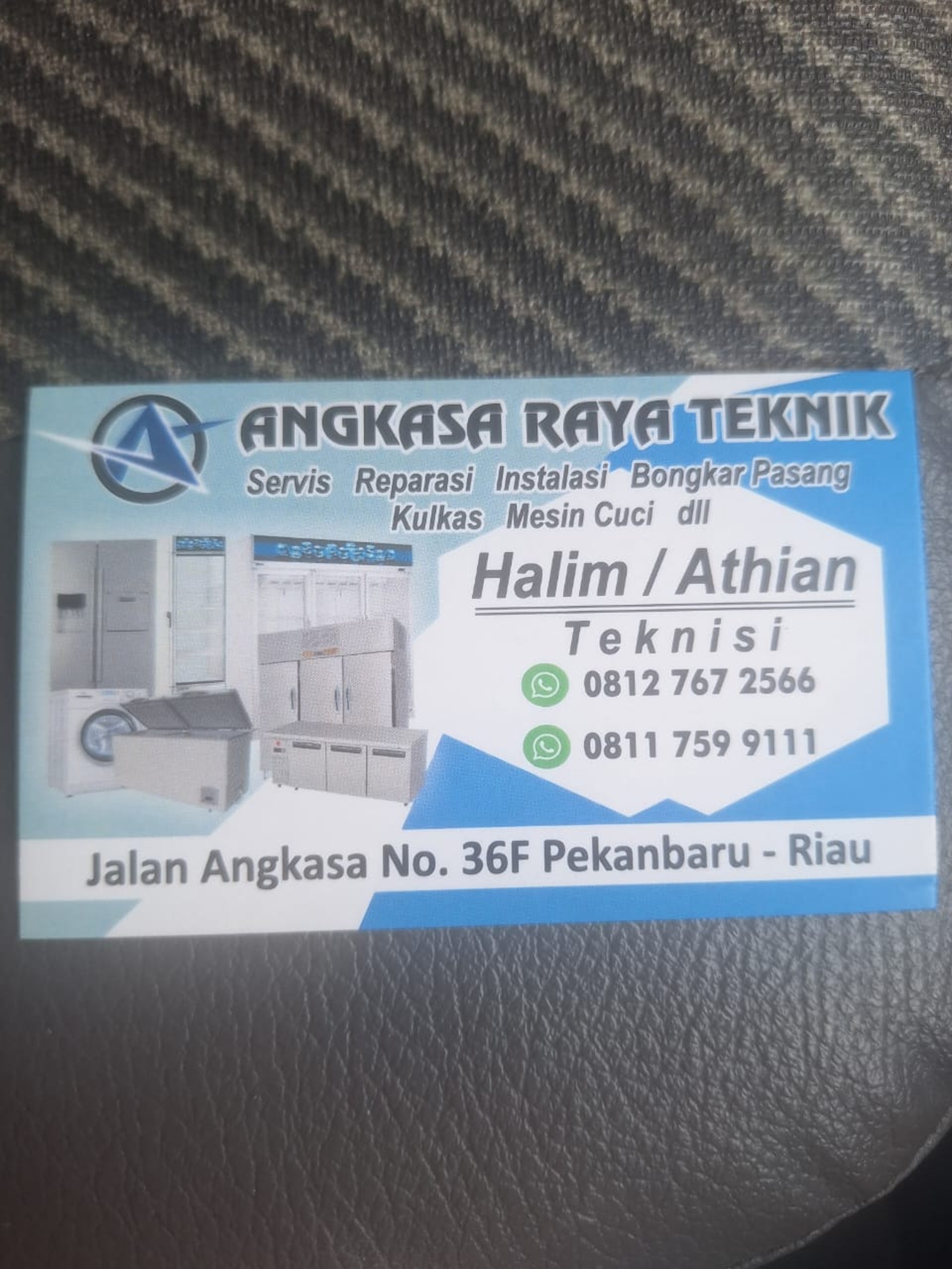 black and brown leather padded tub sofa