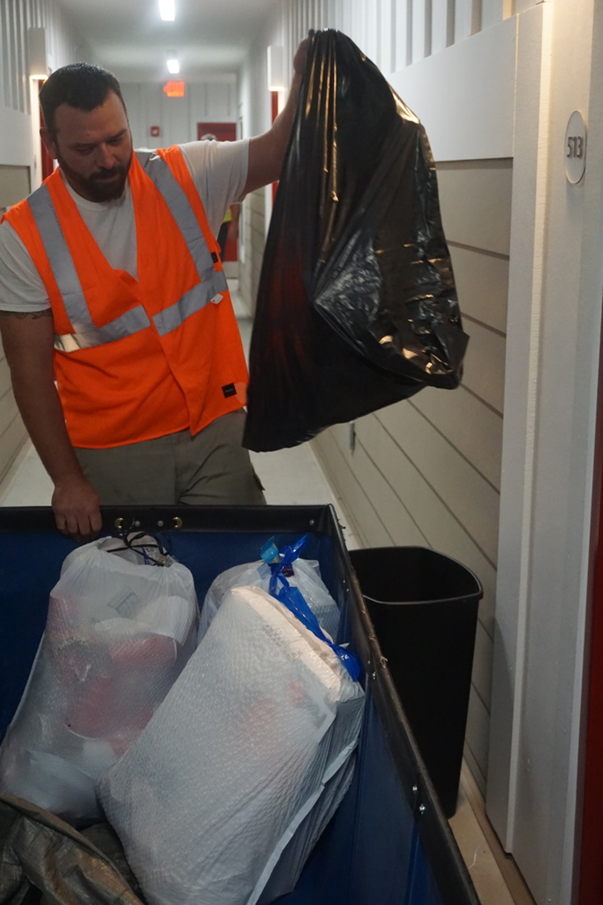 black and brown leather padded tub sofa