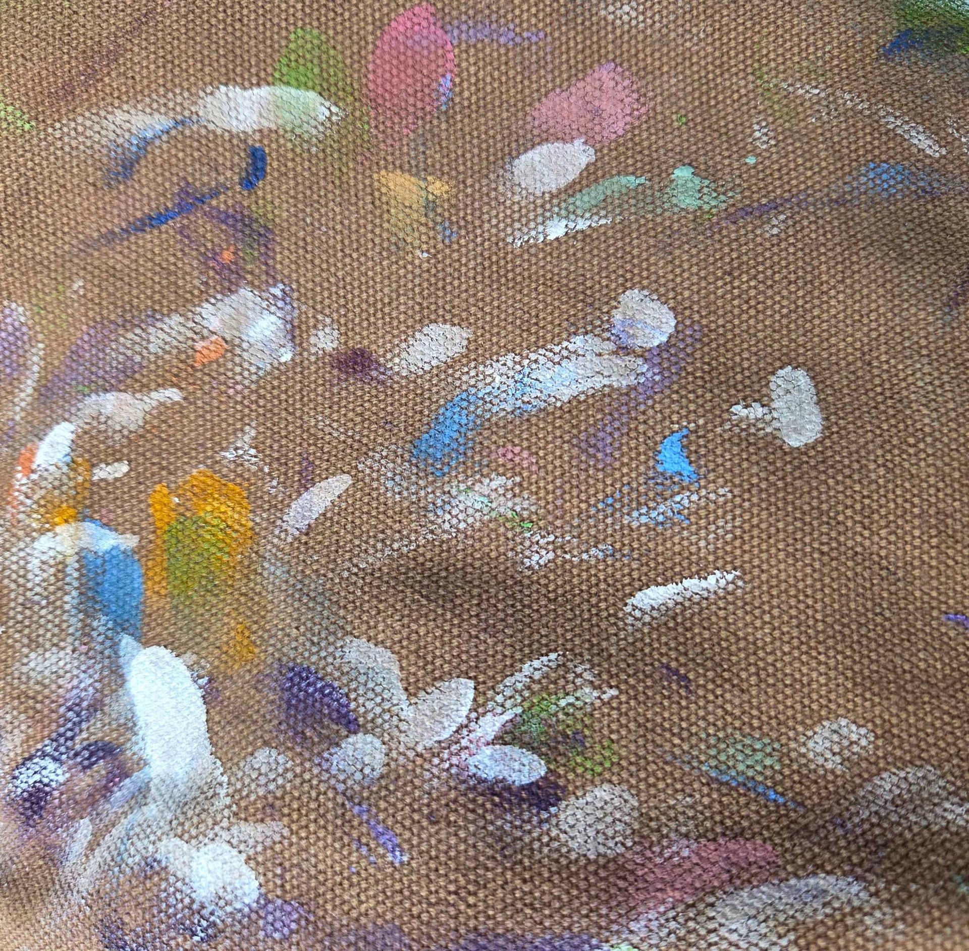 an abstract photo of a curved building with a blue sky in the background