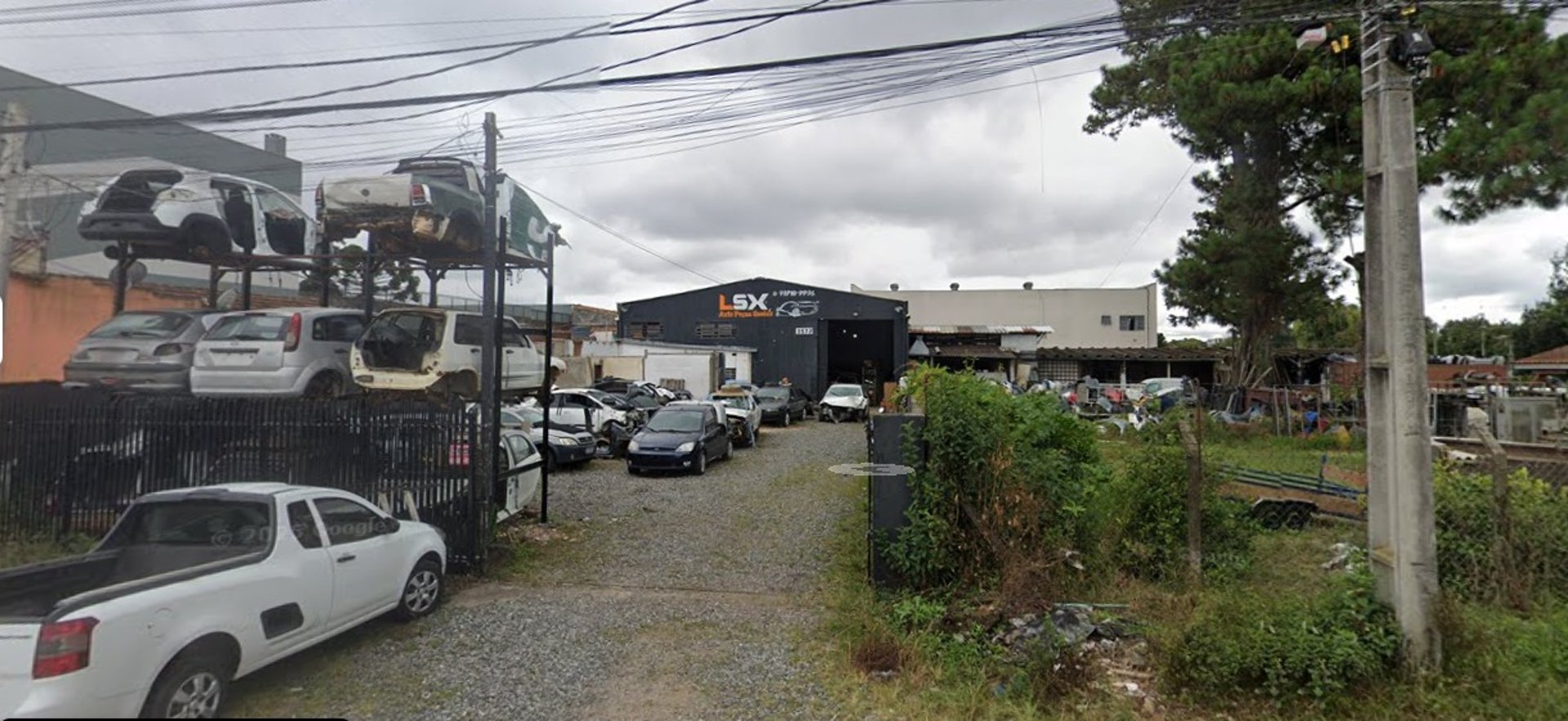 woman wearing yellow long-sleeved dress under white clouds and blue sky during daytime