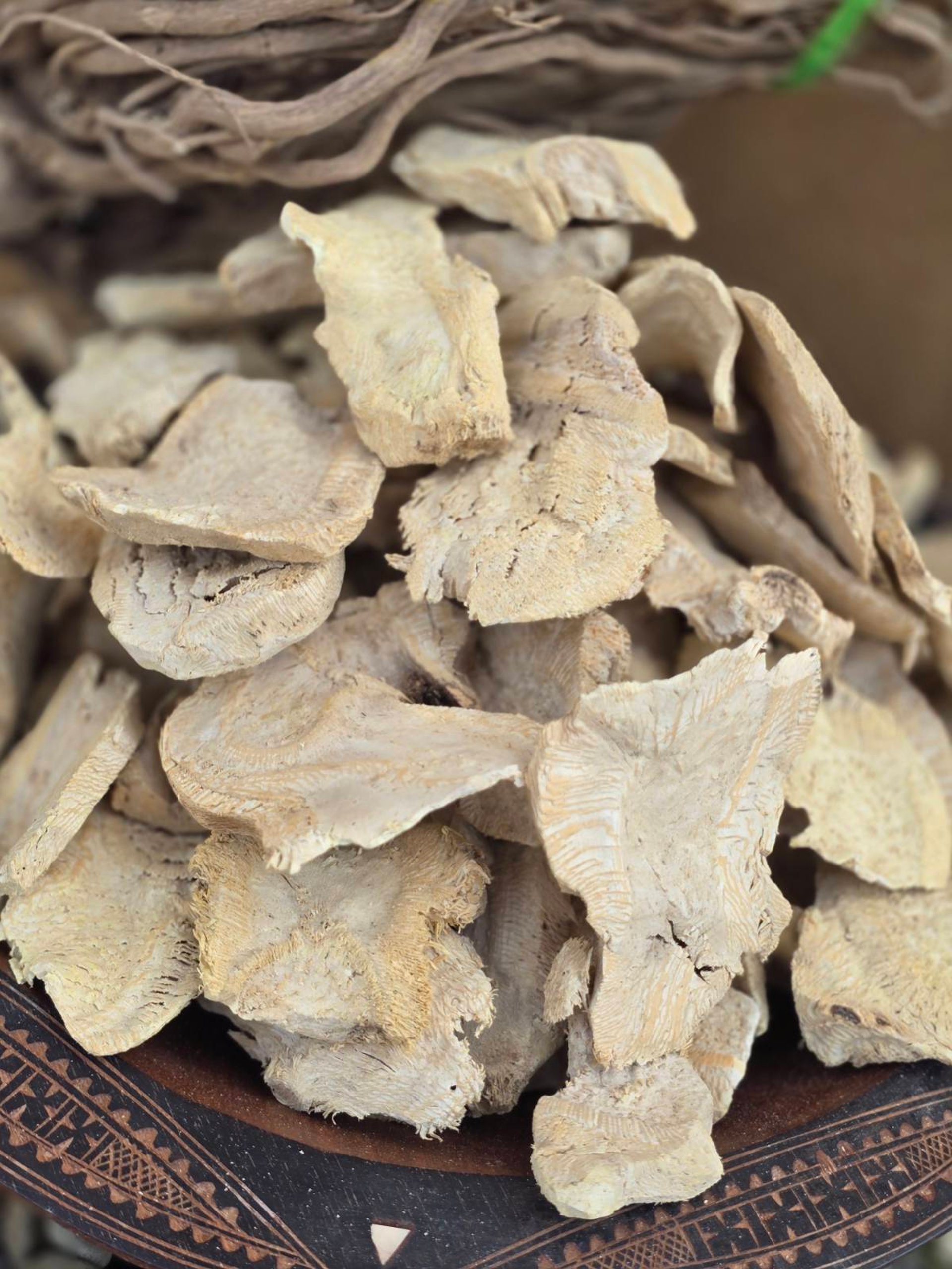 woman wearing yellow long-sleeved dress under white clouds and blue sky during daytime