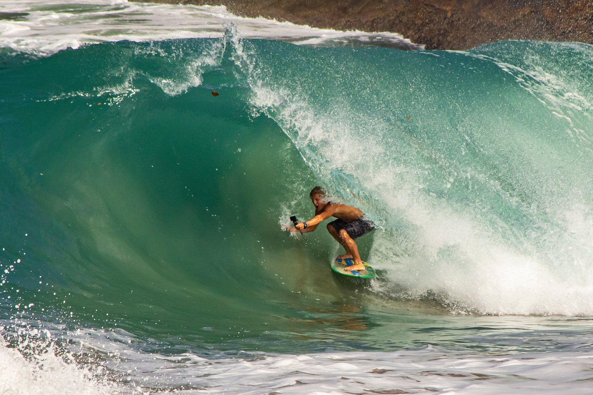 an abstract photo of a curved building with a blue sky in the background
