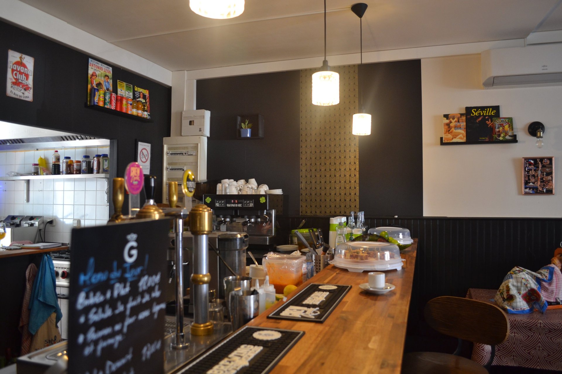 black and brown leather padded tub sofa