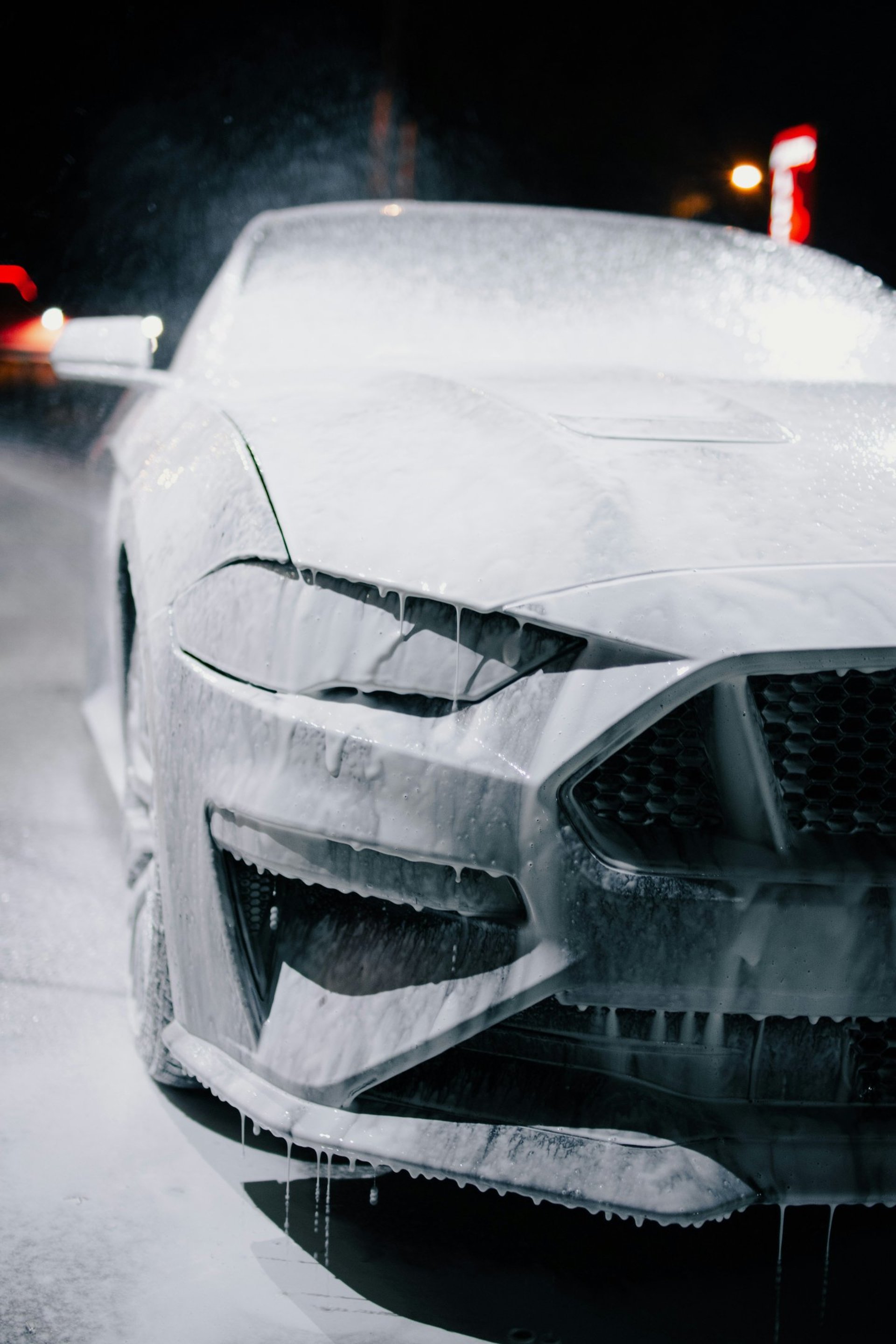 an abstract photo of a curved building with a blue sky in the background
