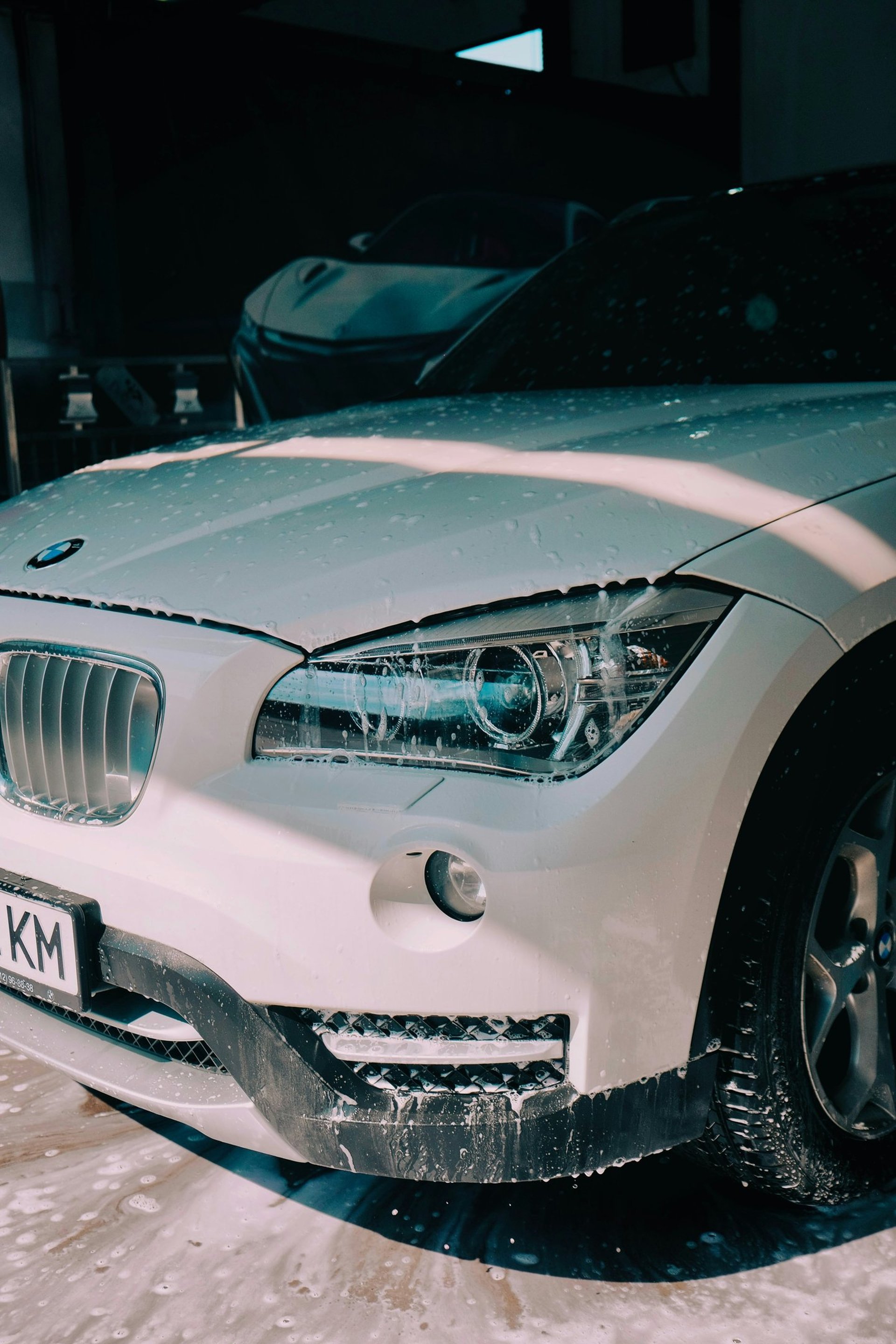 an abstract photo of a curved building with a blue sky in the background