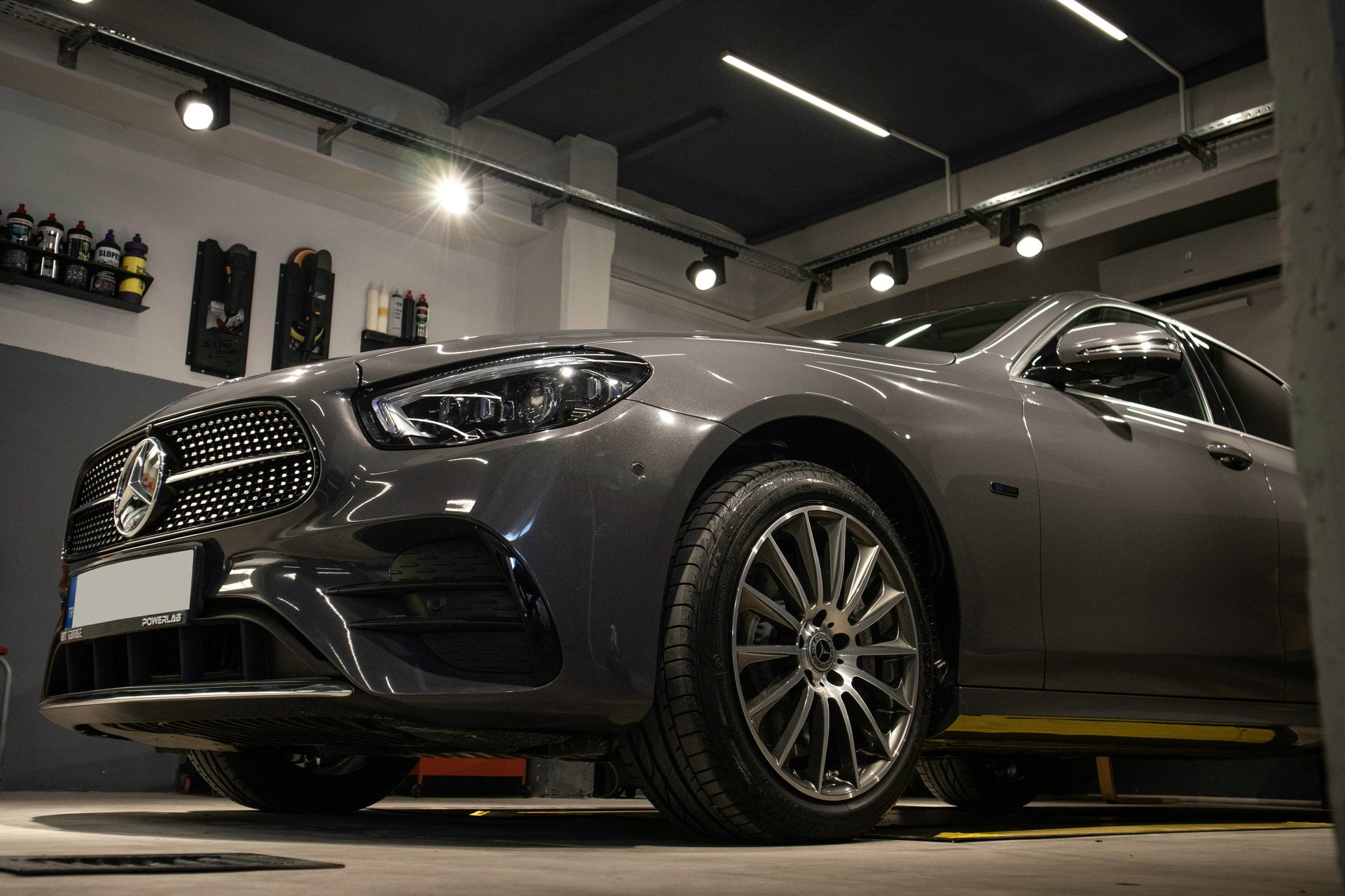 an abstract photo of a curved building with a blue sky in the background