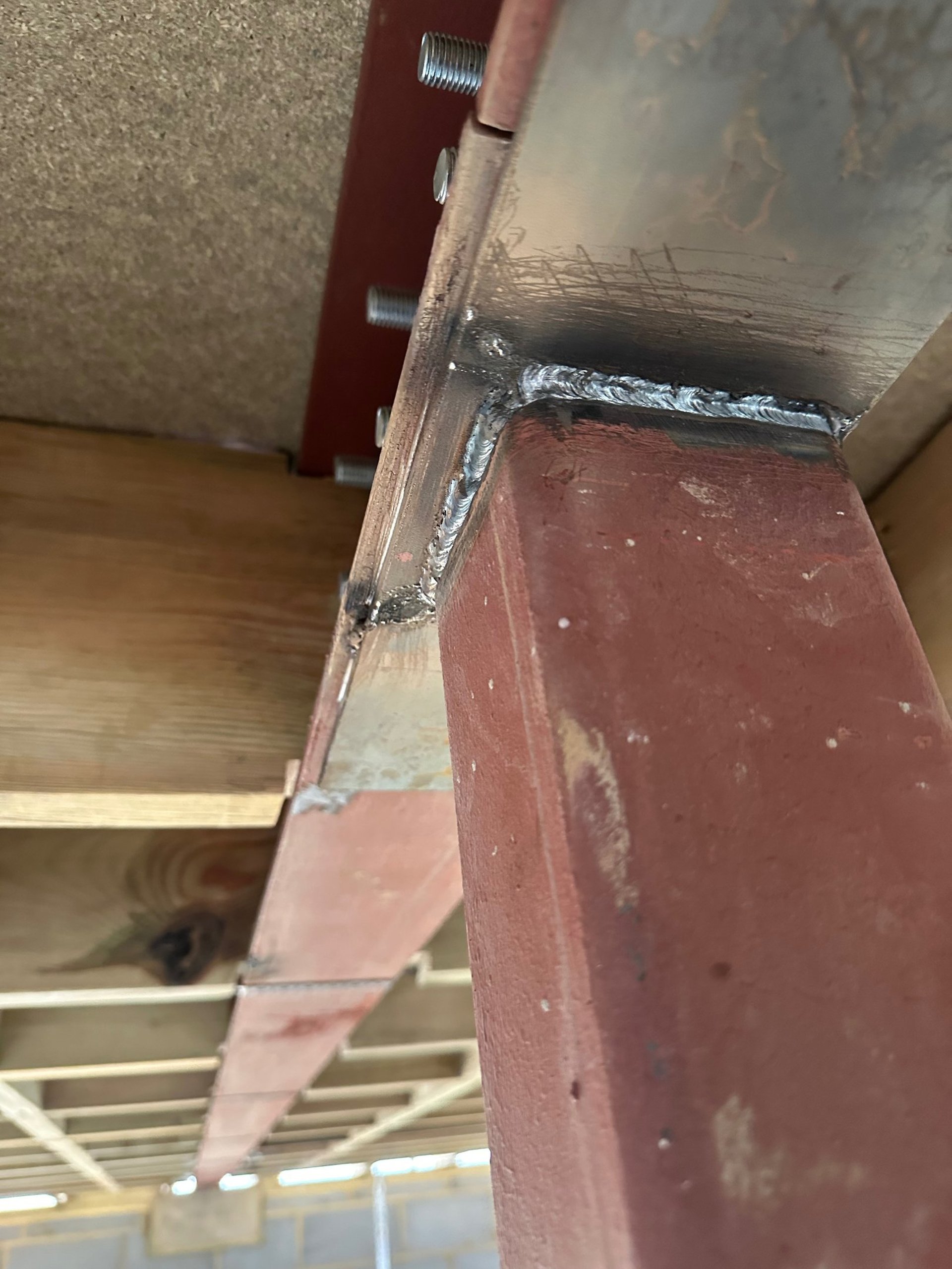 a man is working on a piece of art