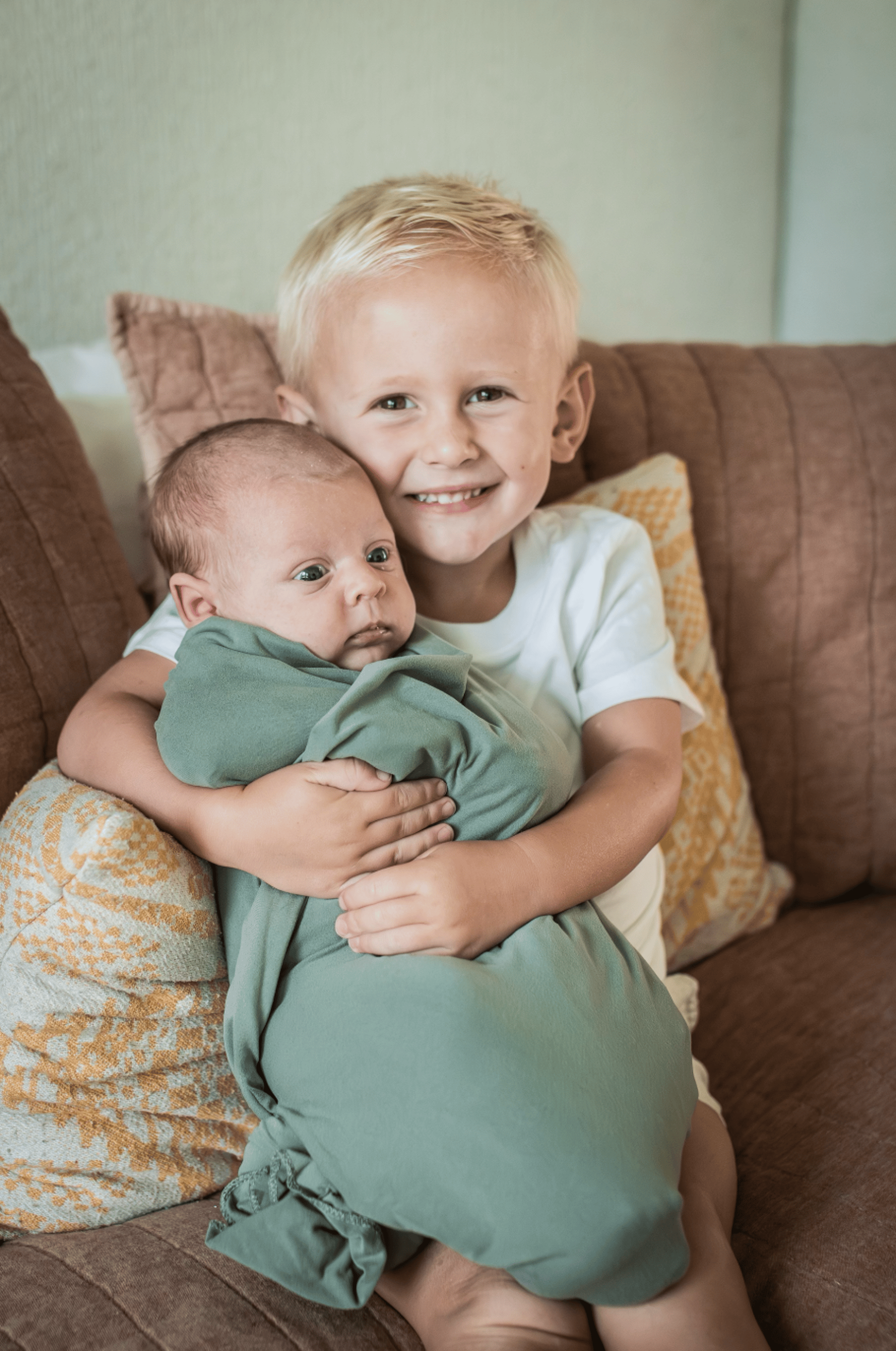 woman wearing yellow long-sleeved dress under white clouds and blue sky during daytime