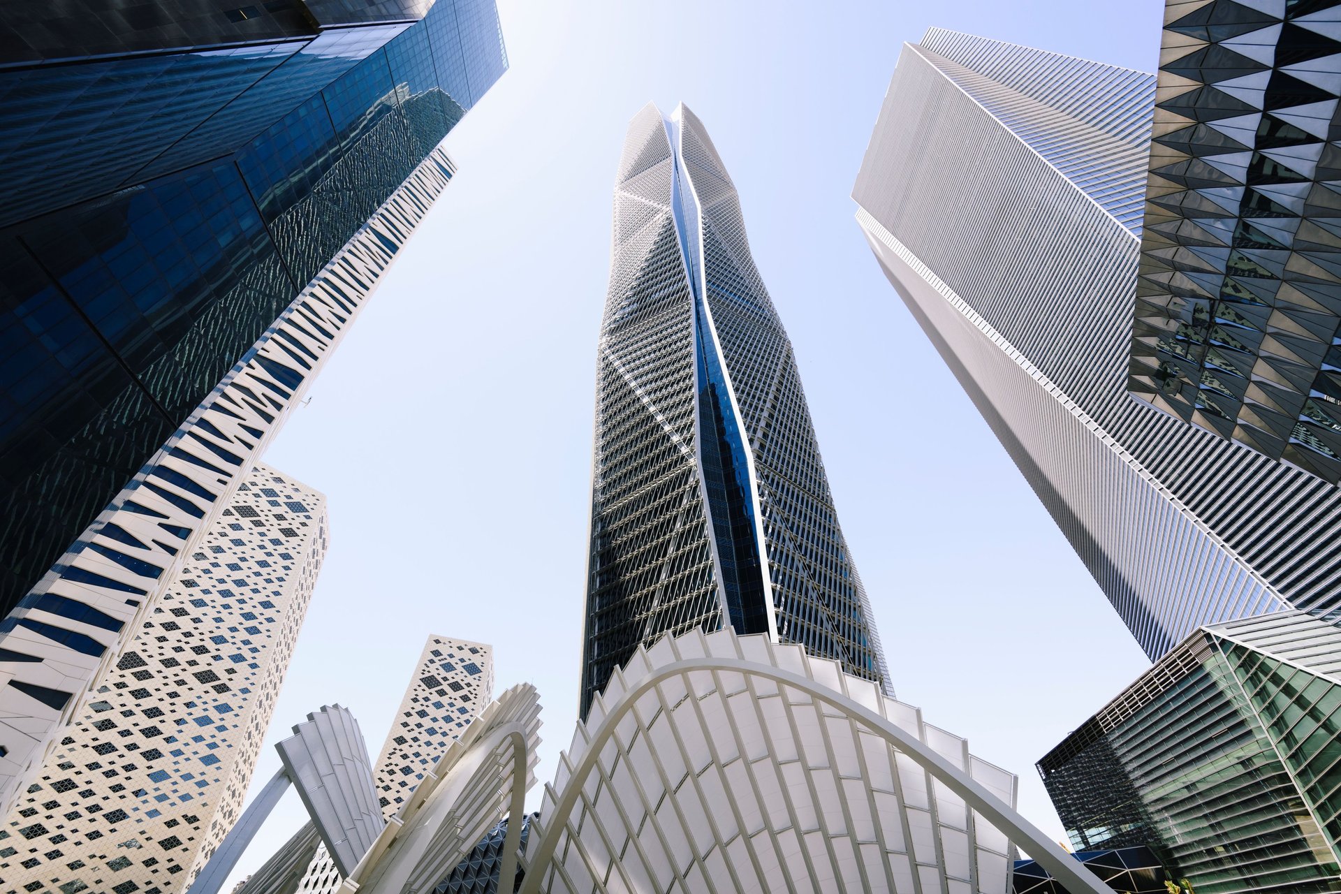 low angle photo of city high rise buildings during daytime