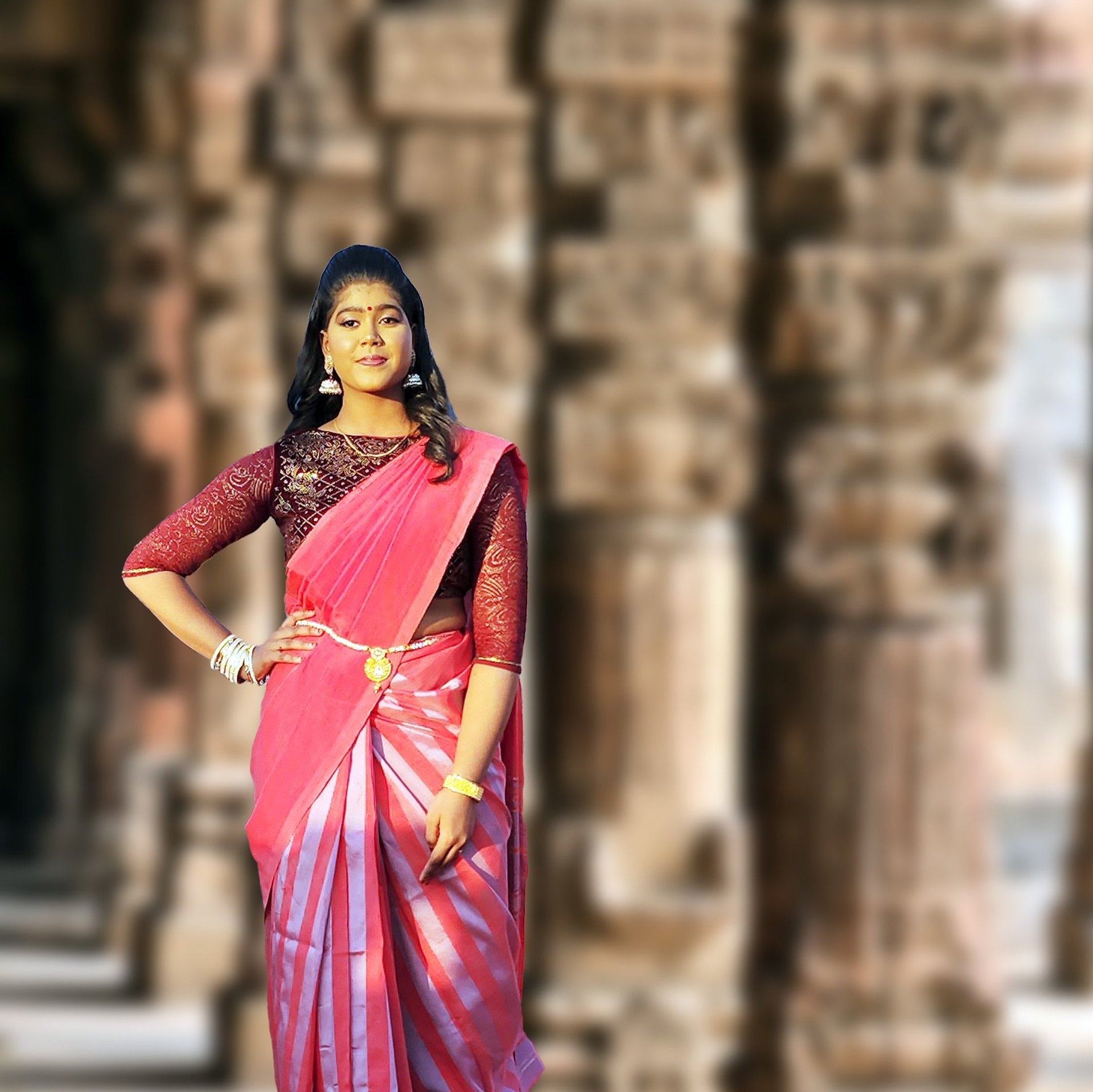 woman in pink and white sari dress