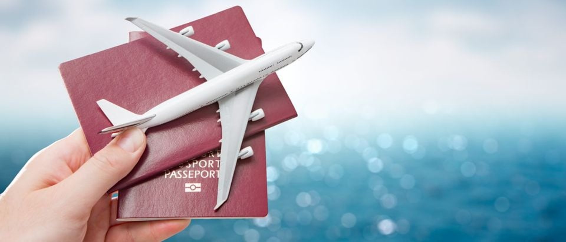 clear glass pyramid near buildings during night