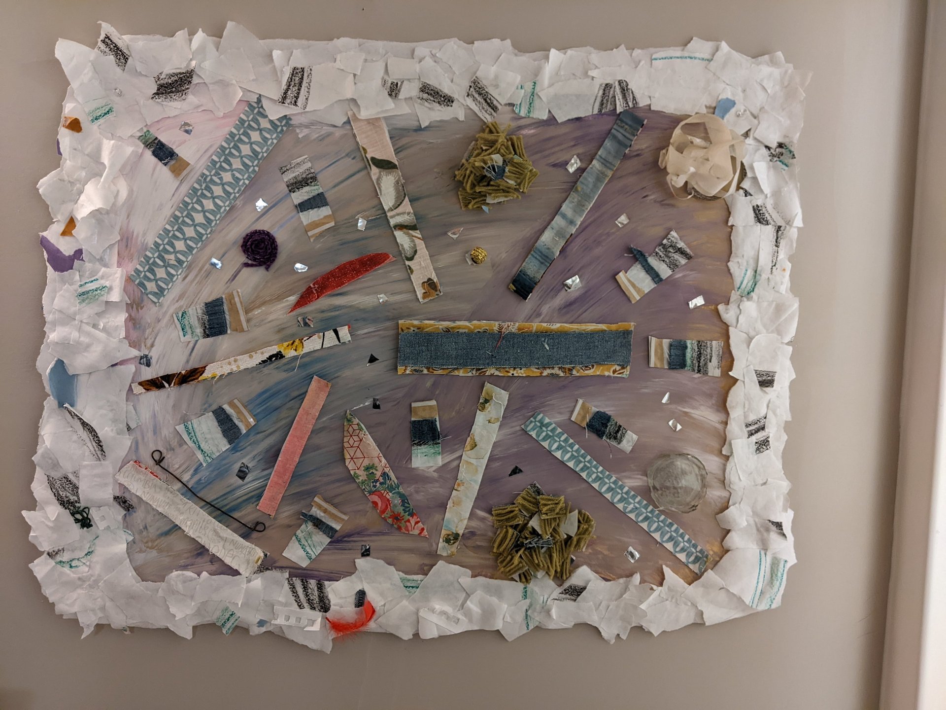 an abstract photo of a curved building with a blue sky in the background