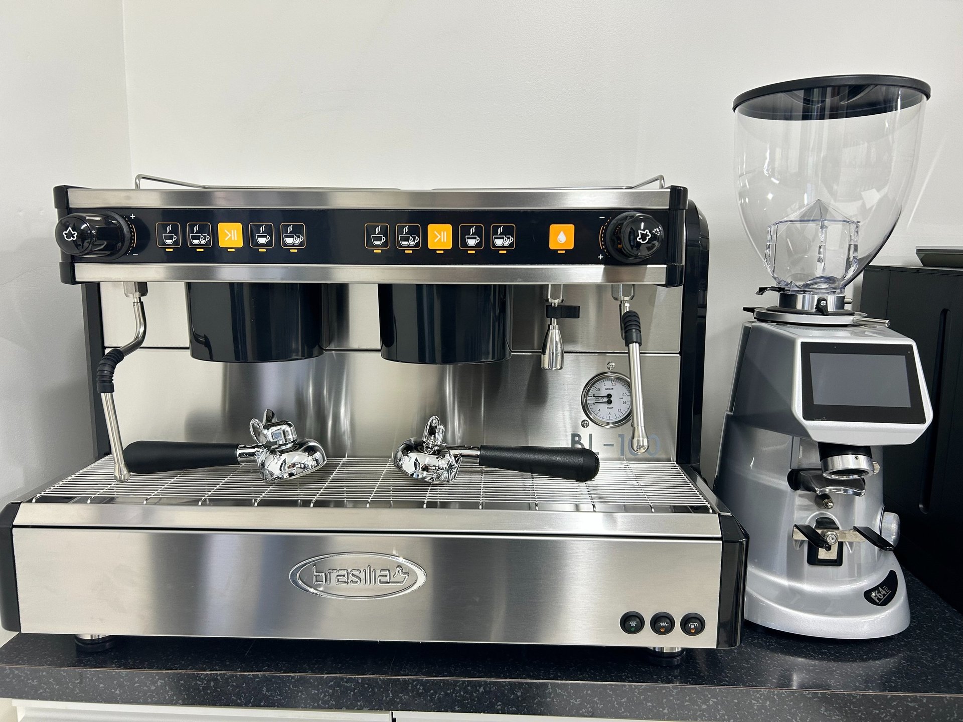 an abstract photo of a curved building with a blue sky in the background