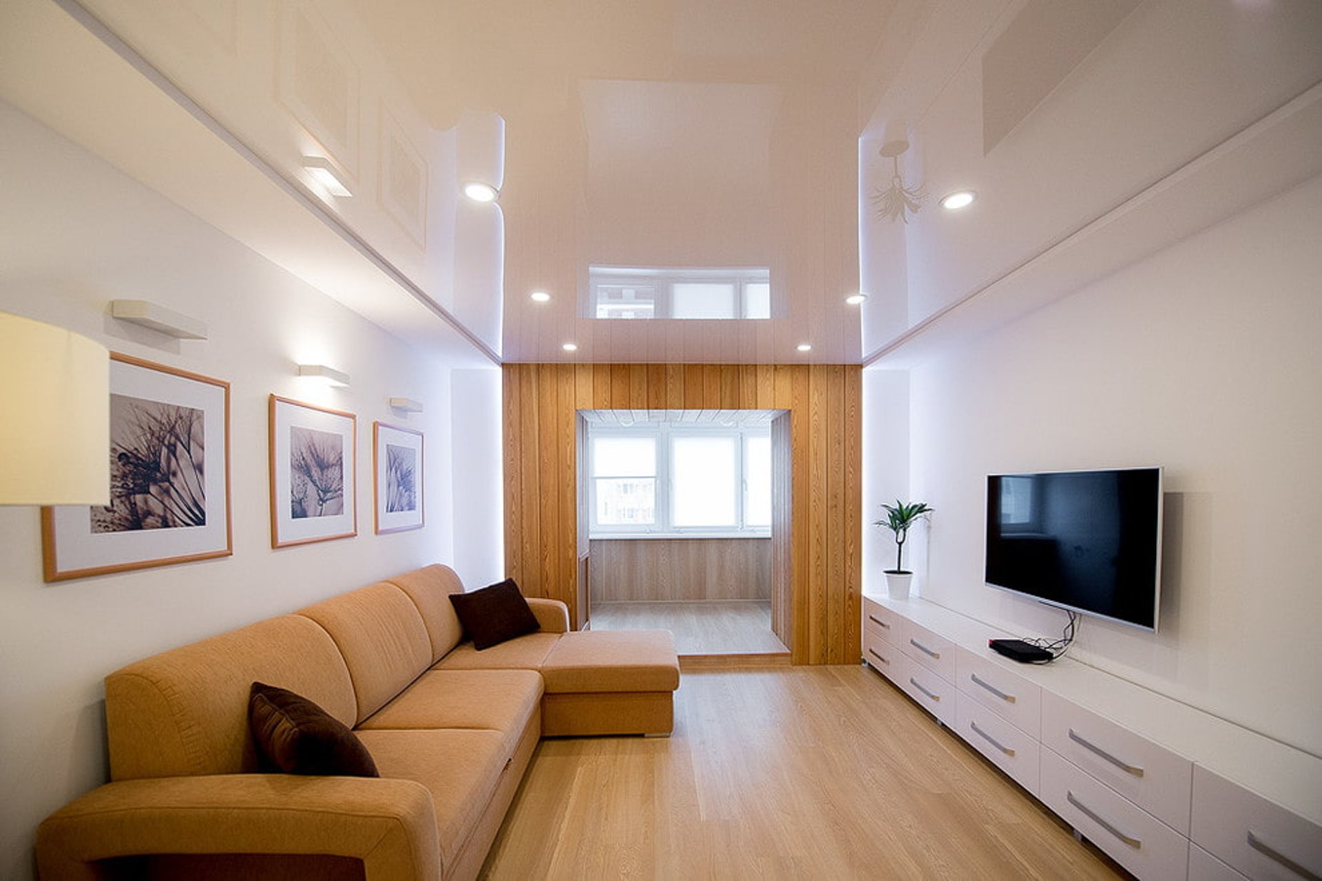 an abstract photo of a curved building with a blue sky in the background