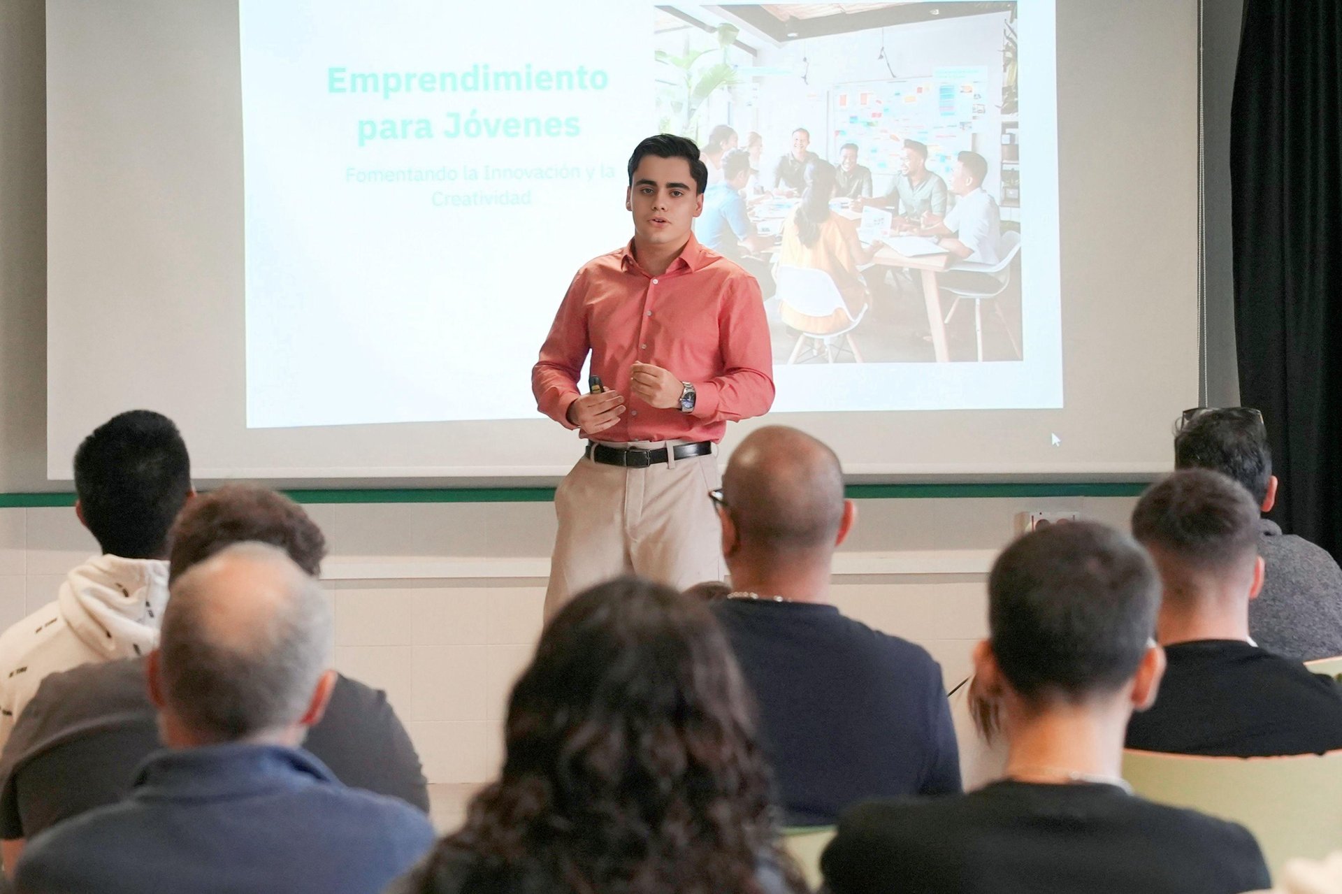 an abstract photo of a curved building with a blue sky in the background