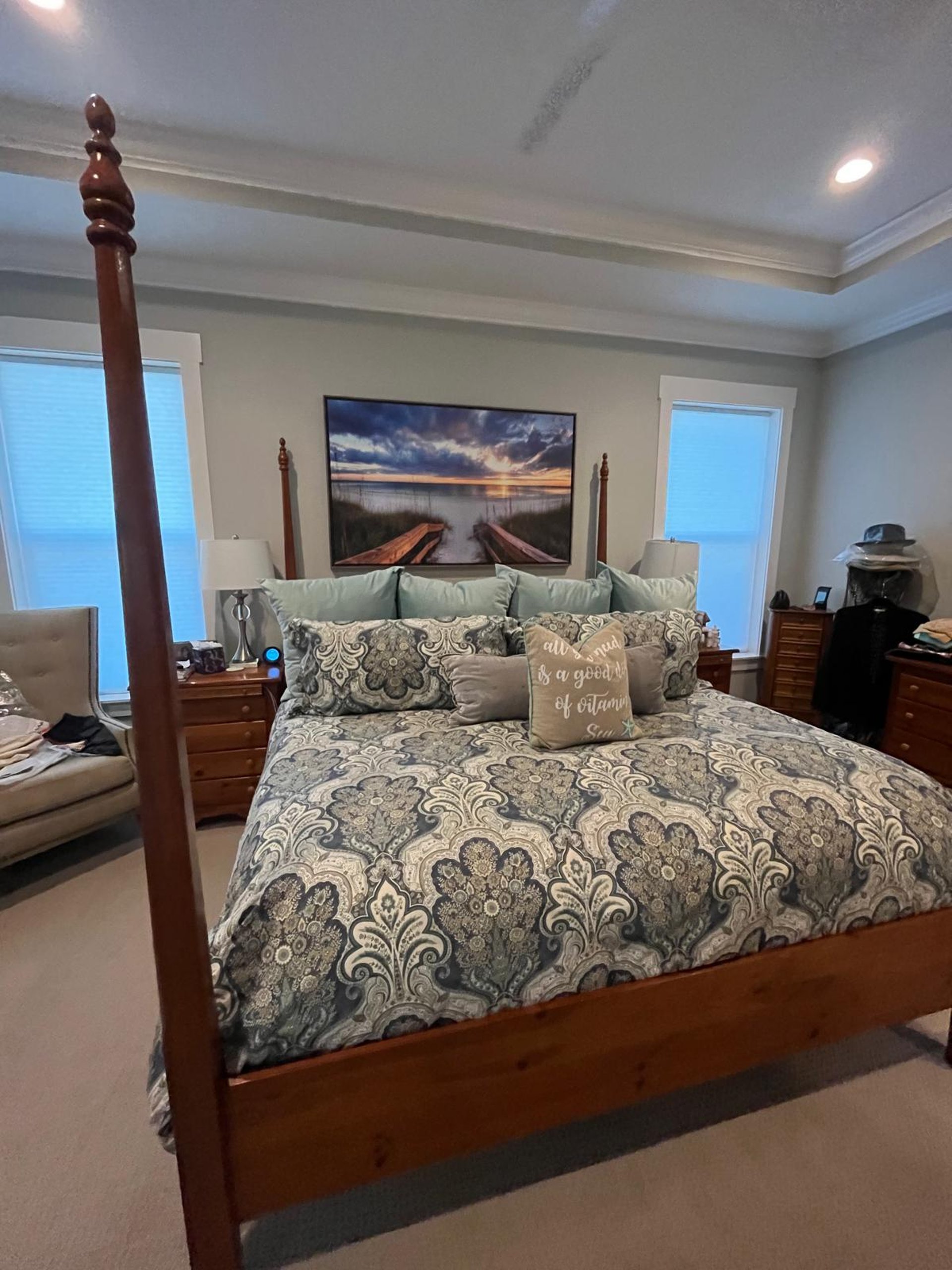 woman wearing yellow long-sleeved dress under white clouds and blue sky during daytime