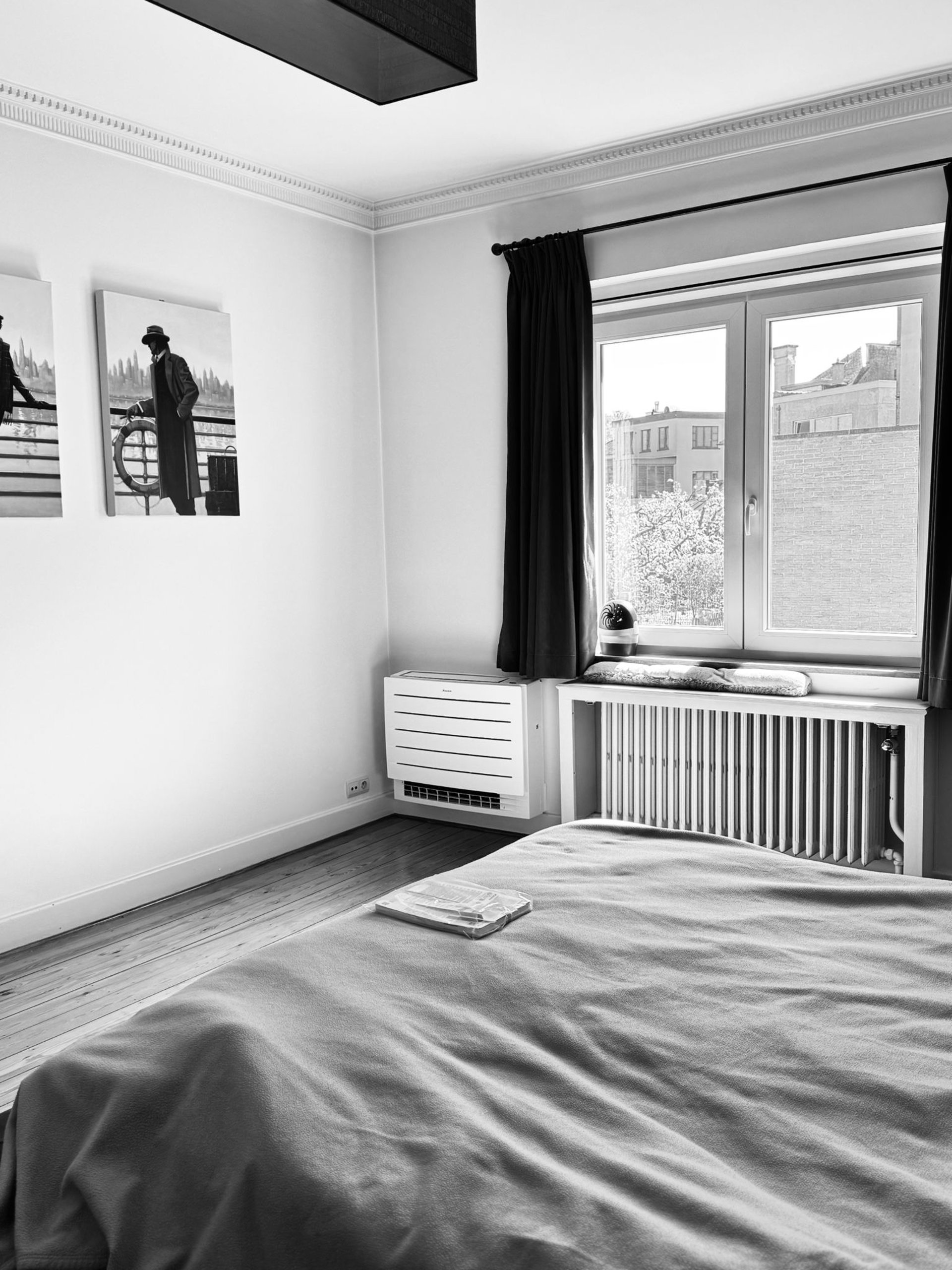 an abstract photo of a curved building with a blue sky in the background