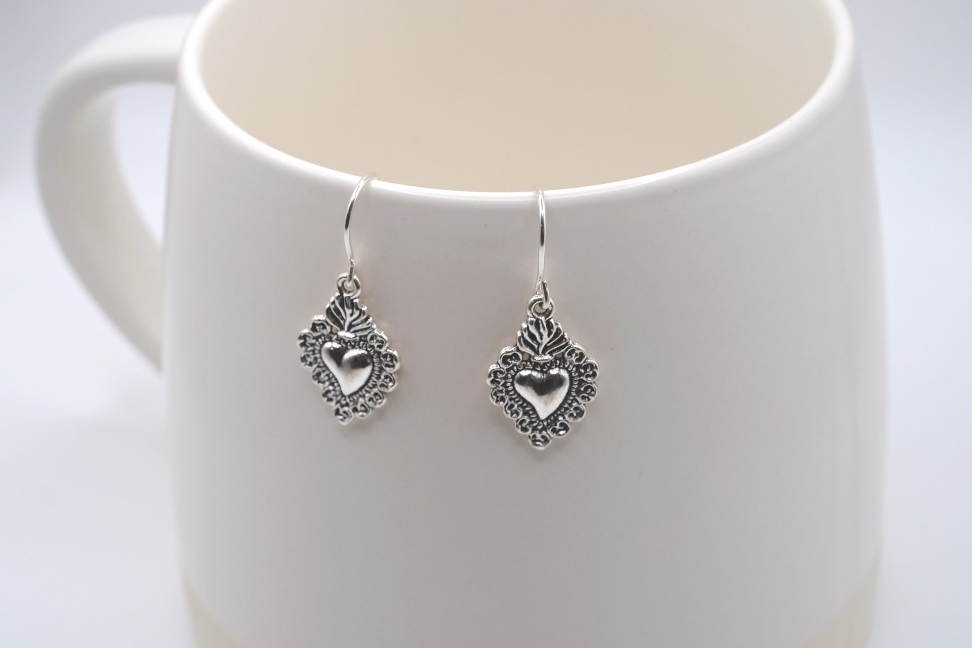 a woman holding her hand up