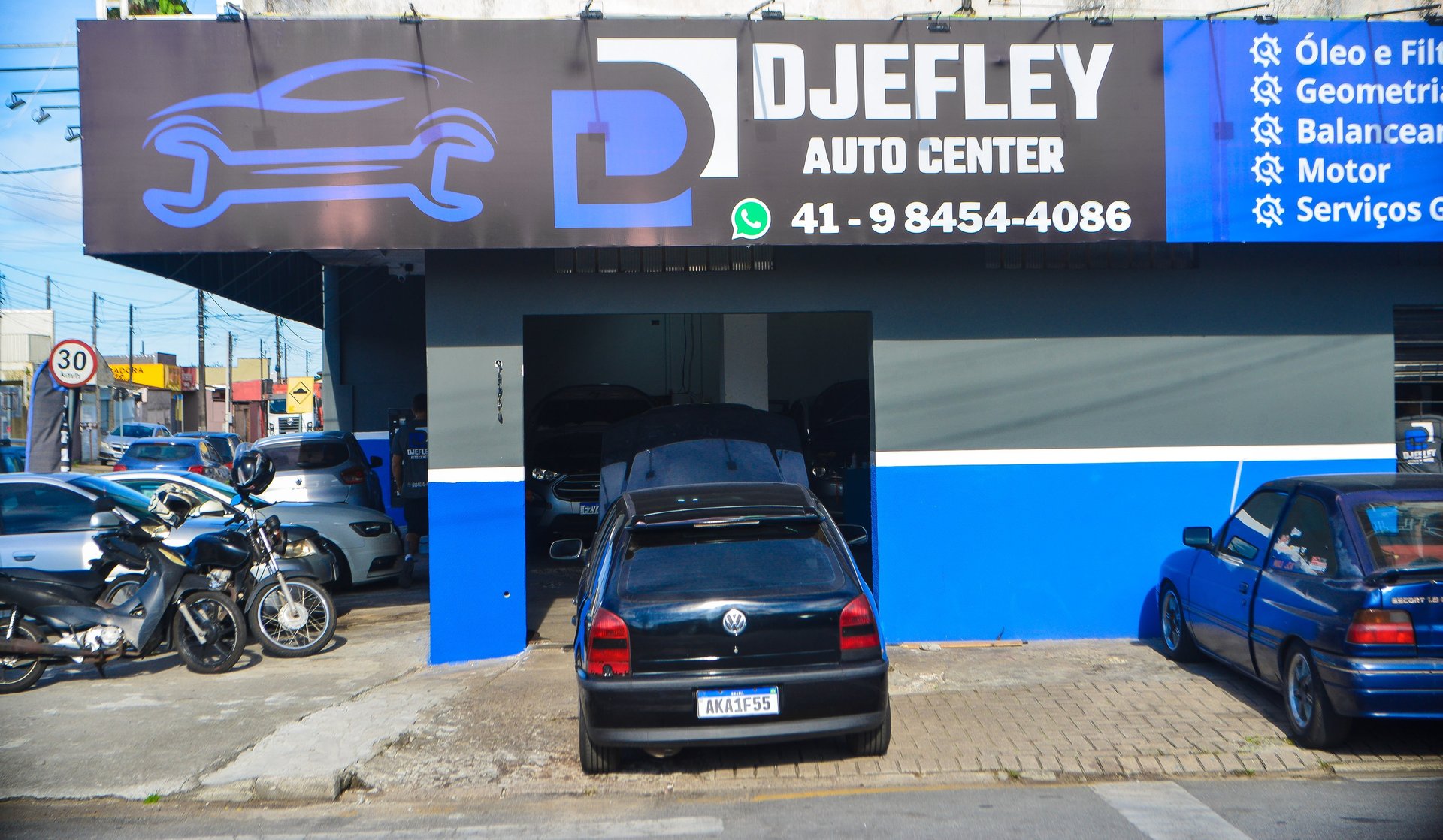black and brown leather padded tub sofa