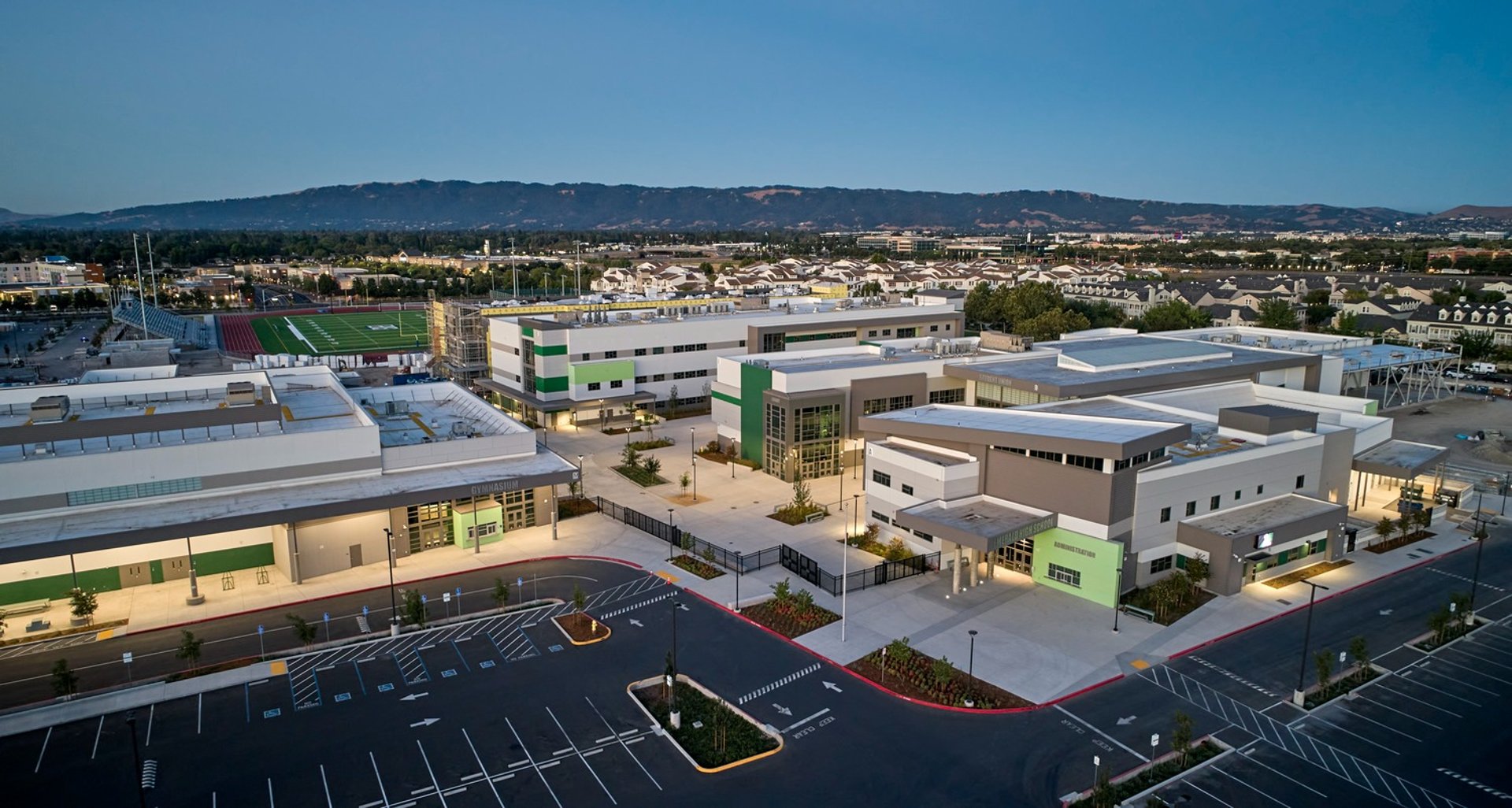 black and brown leather padded tub sofa