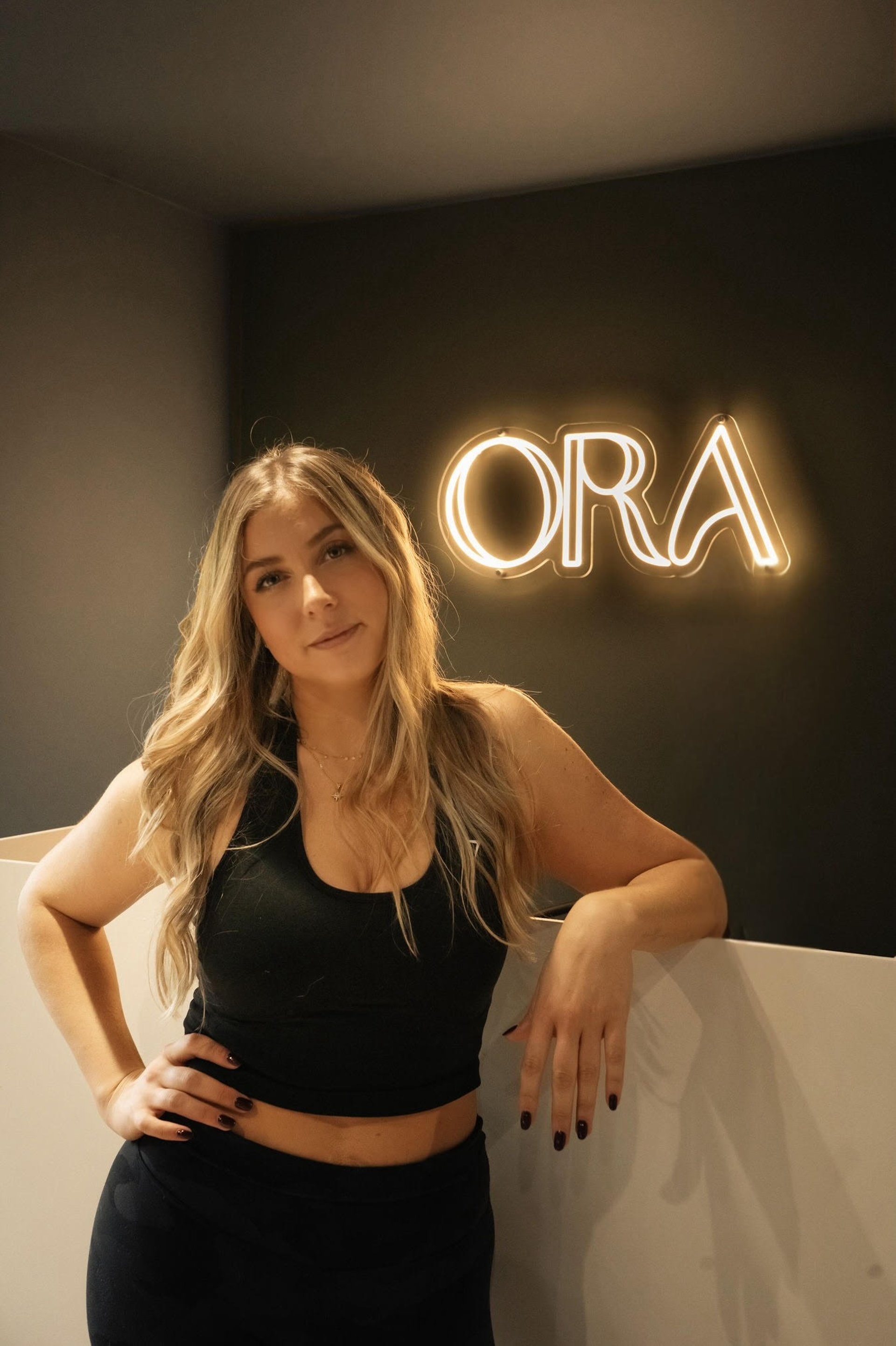 woman wearing yellow long-sleeved dress under white clouds and blue sky during daytime