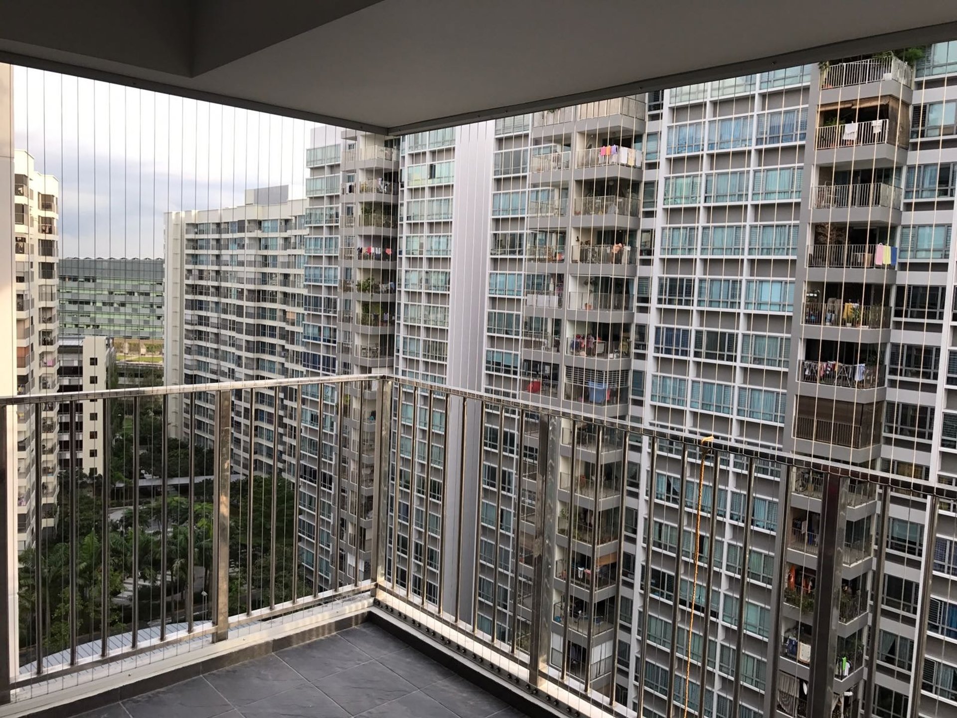 an abstract photo of a curved building with a blue sky in the background