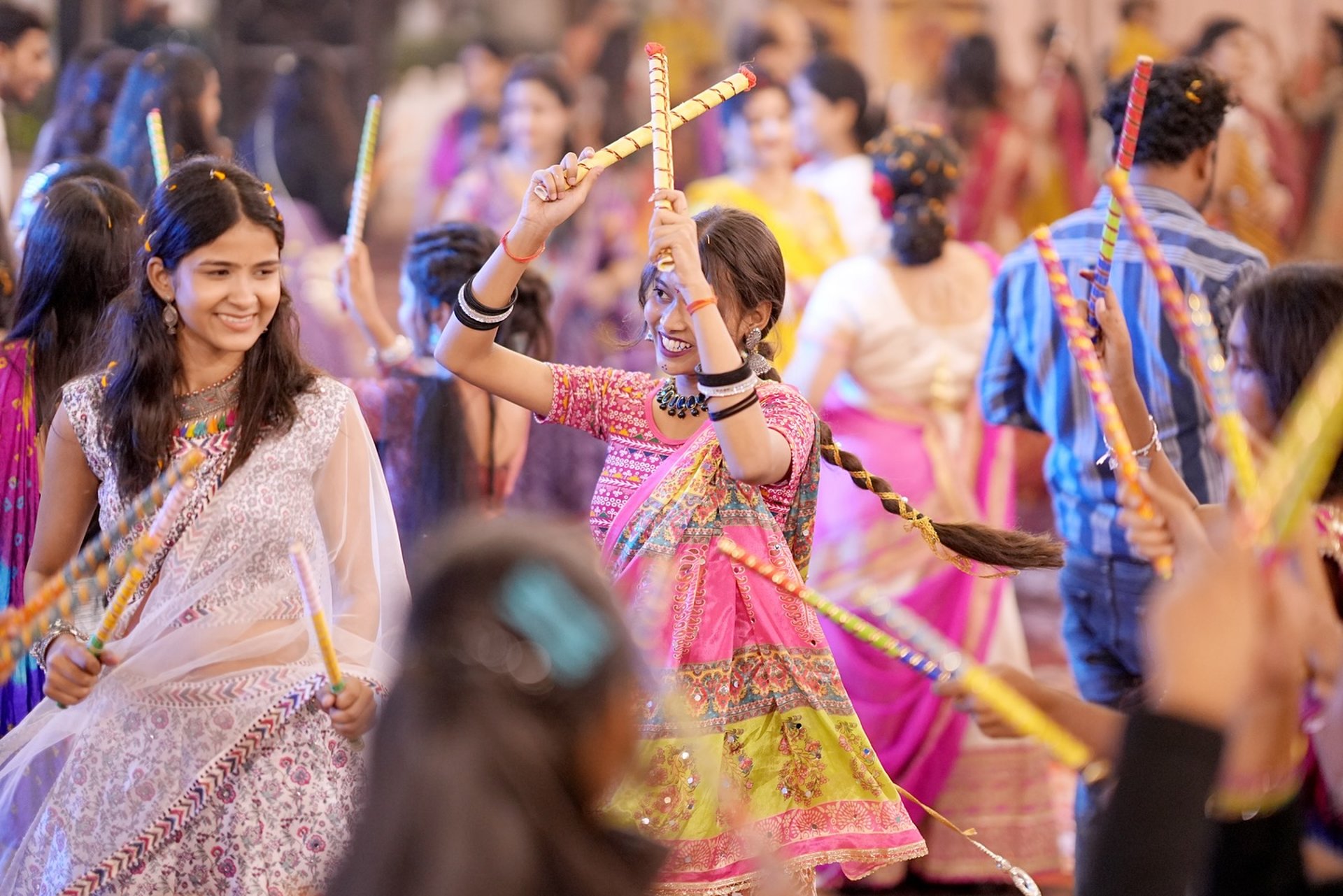 woman wearing yellow long-sleeved dress under white clouds and blue sky during daytime