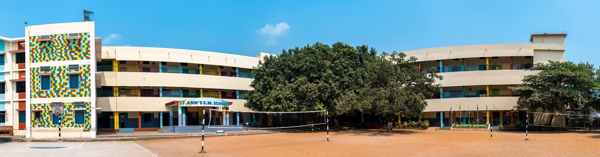 gray scissor with envelope and pencils