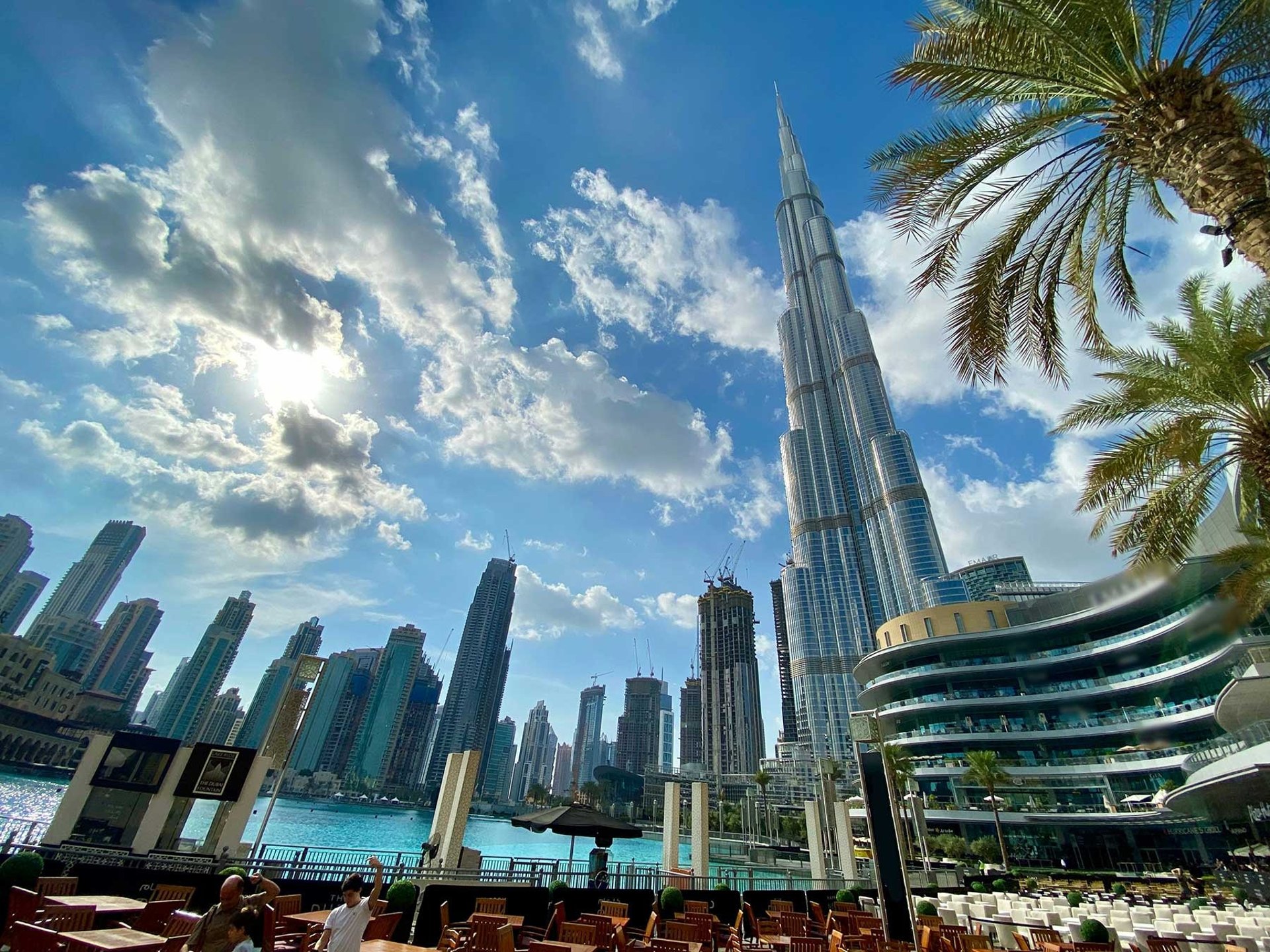 view of Downtown Dubai showing Burj Khalifa, Dubai Opera and high-rise residences overlooking the city center.