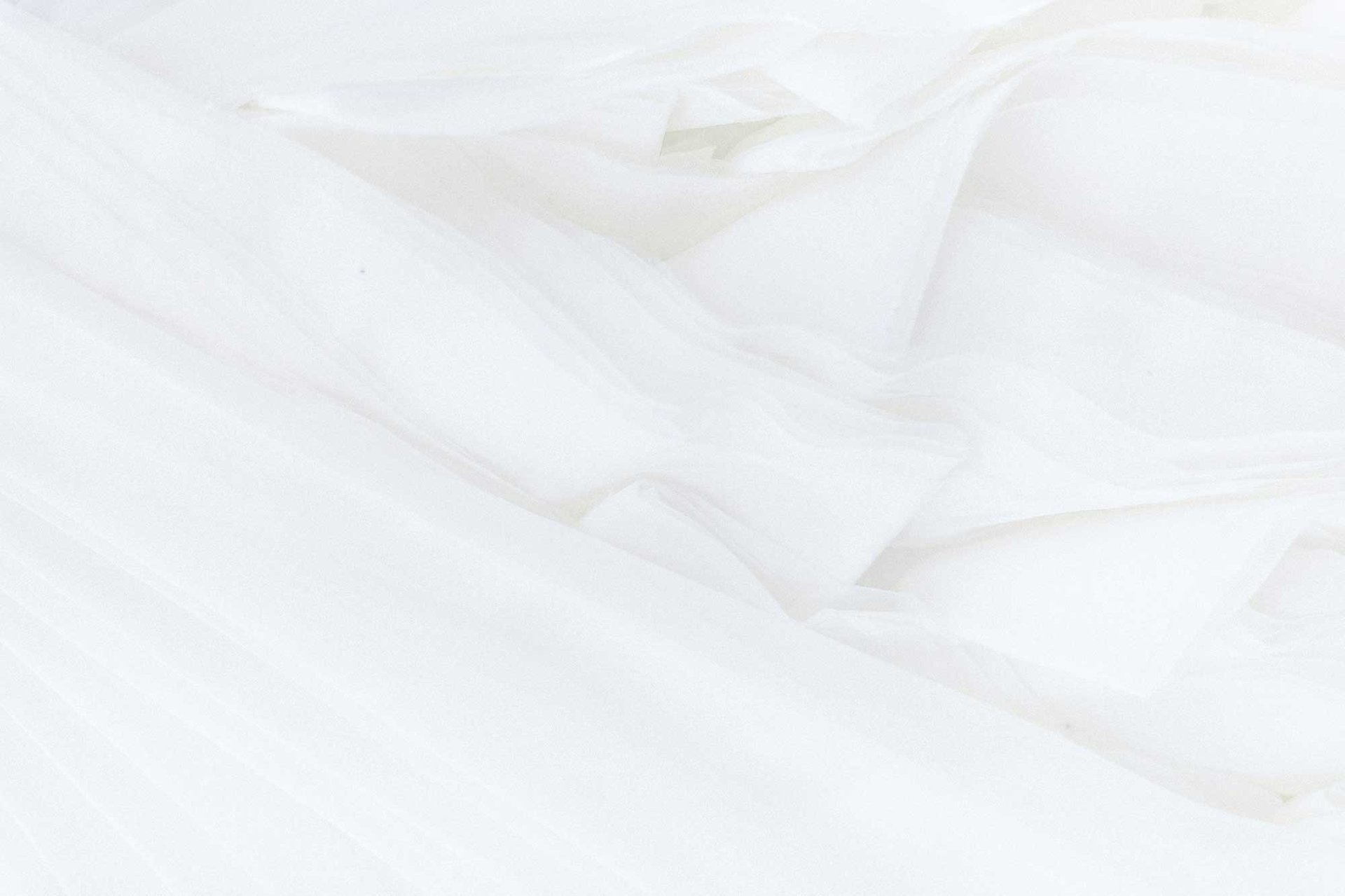 a close up of a white marble counter top