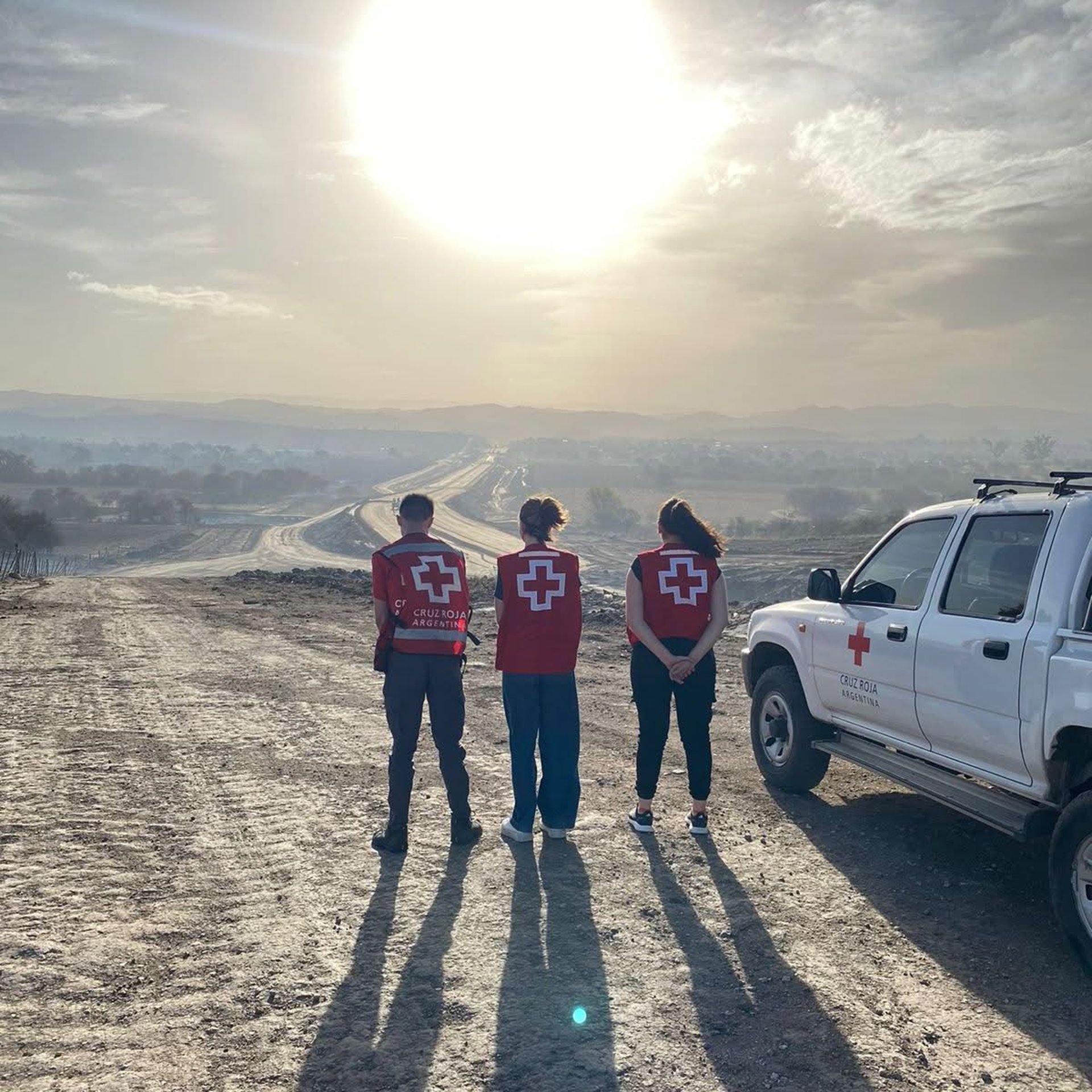 an abstract photo of a curved building with a blue sky in the background