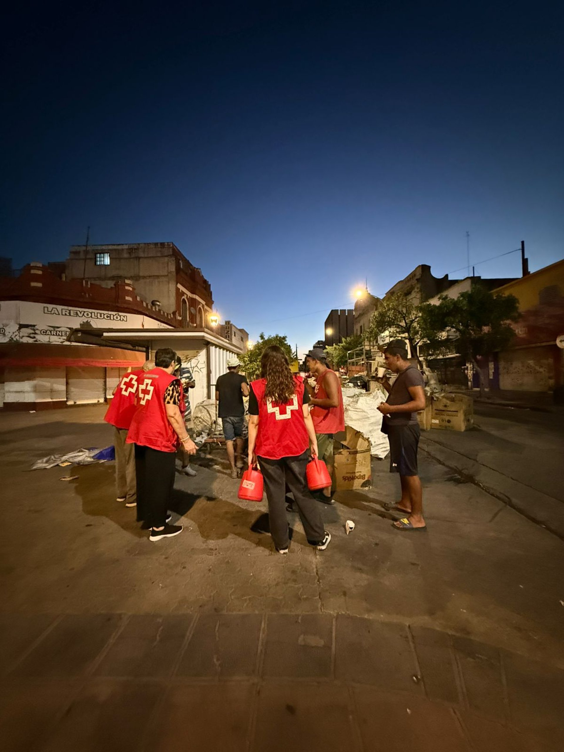 an abstract photo of a curved building with a blue sky in the background