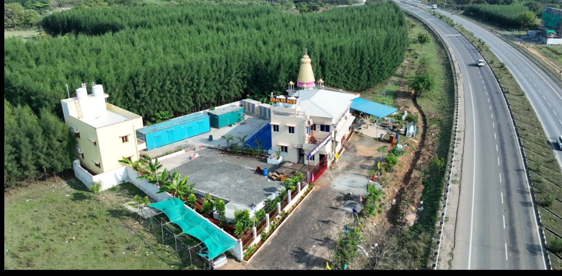 woman wearing yellow long-sleeved dress under white clouds and blue sky during daytime