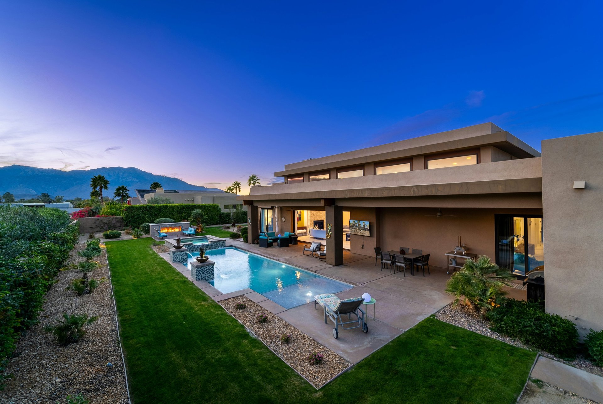 woman wearing yellow long-sleeved dress under white clouds and blue sky during daytime