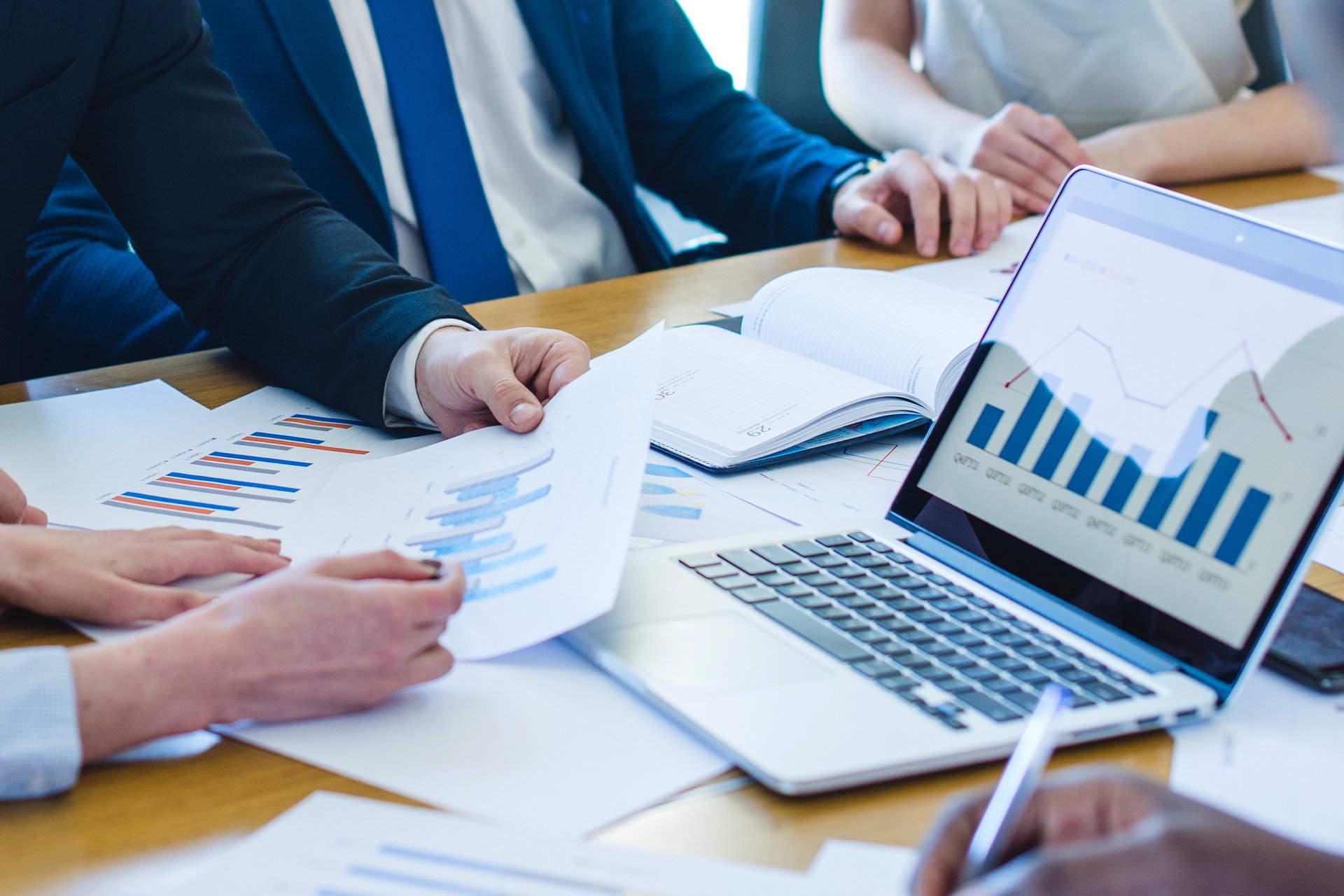 an abstract photo of a curved building with a blue sky in the background