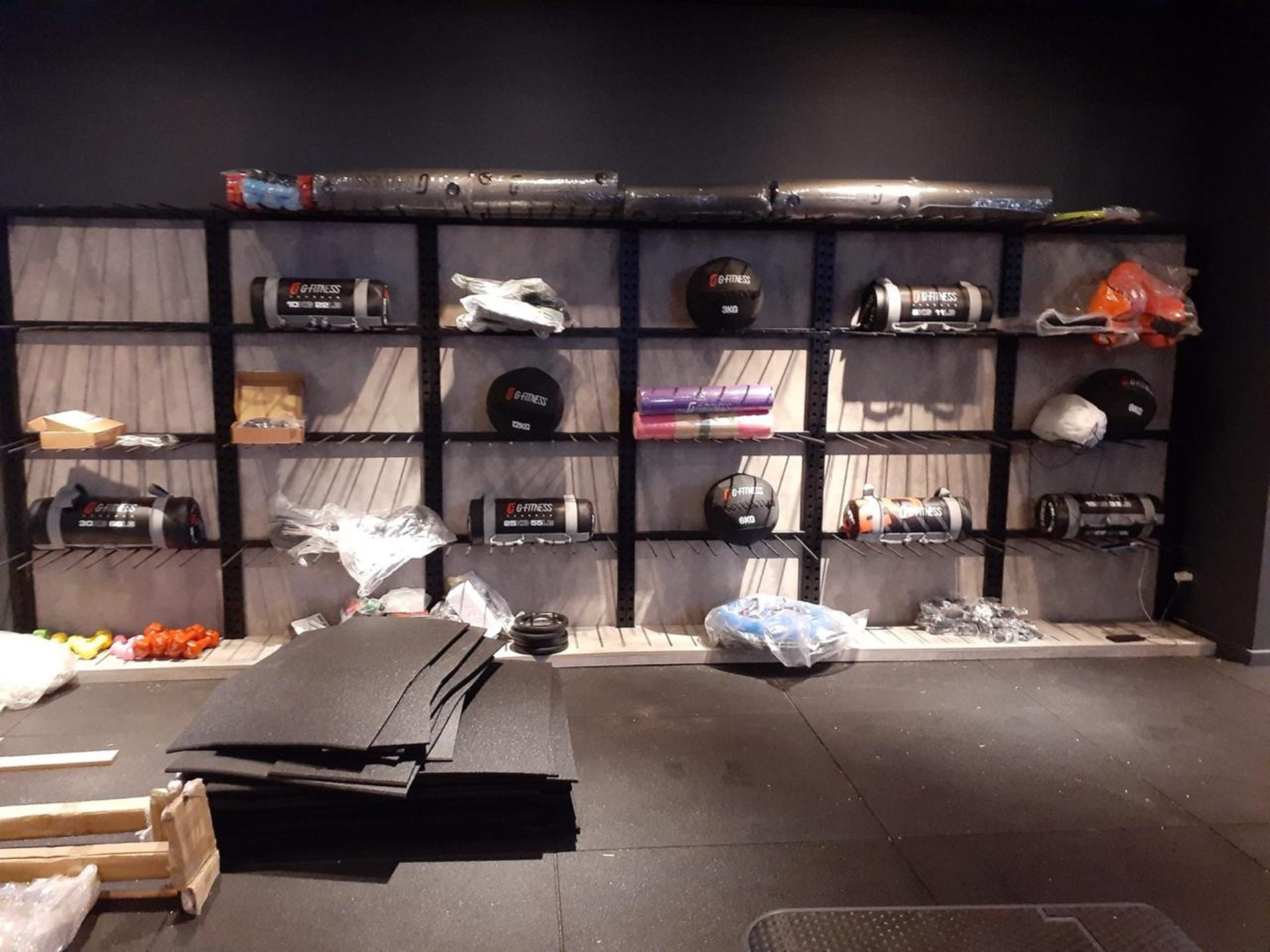 an abstract photo of a curved building with a blue sky in the background