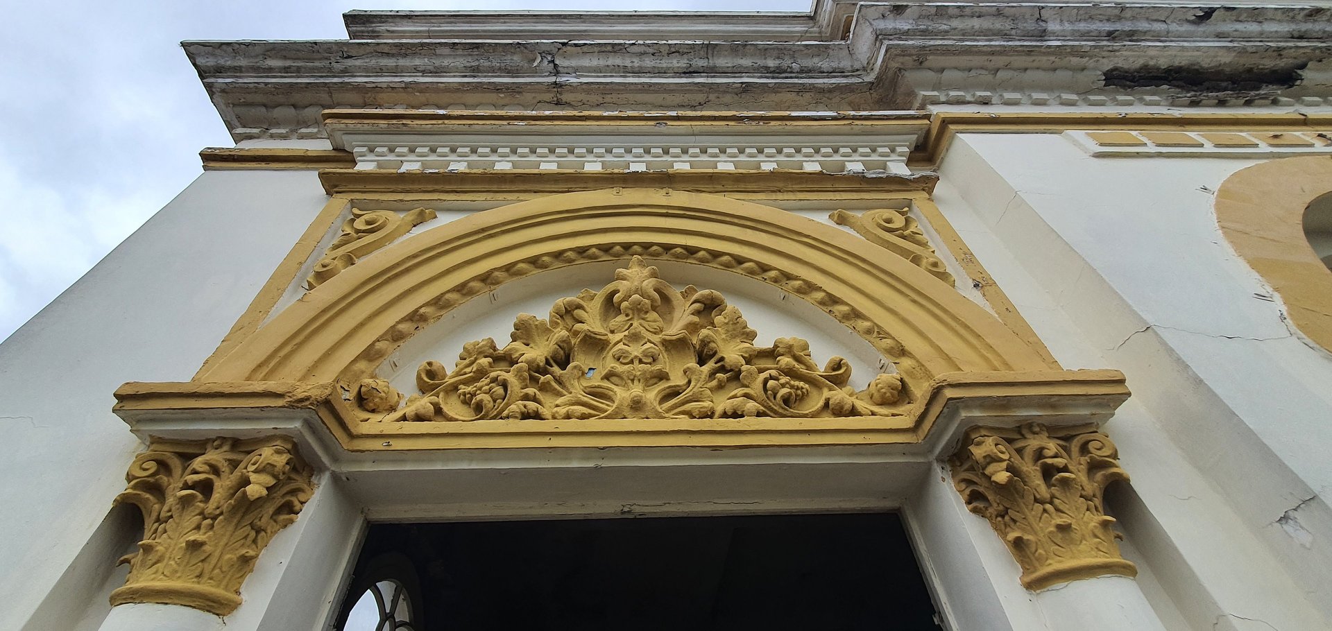 beige concrete building under blue sky during daytime