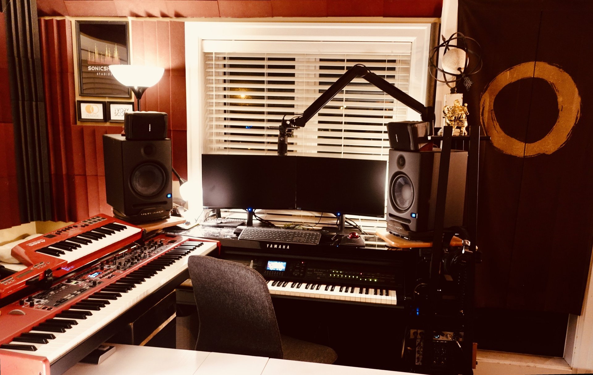 man in blue denim jacket playing piano