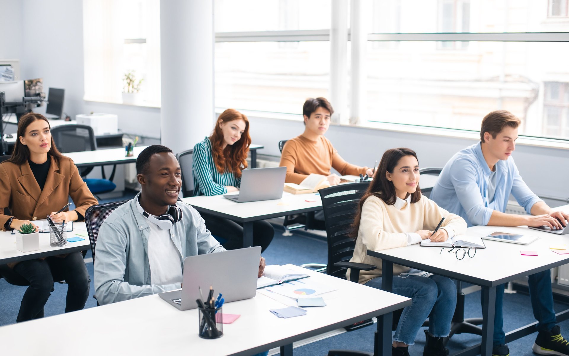 white Good News Is Coming paper on wall