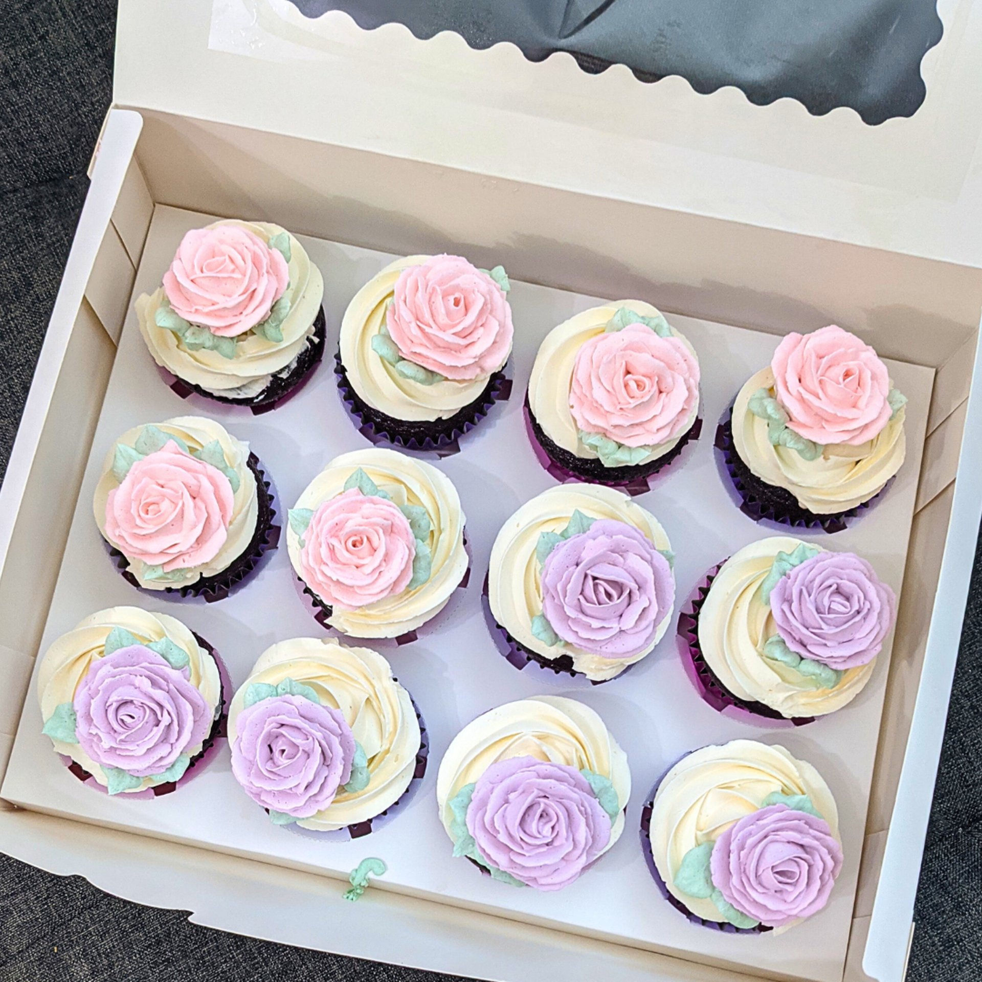 frosting on two cupcakes