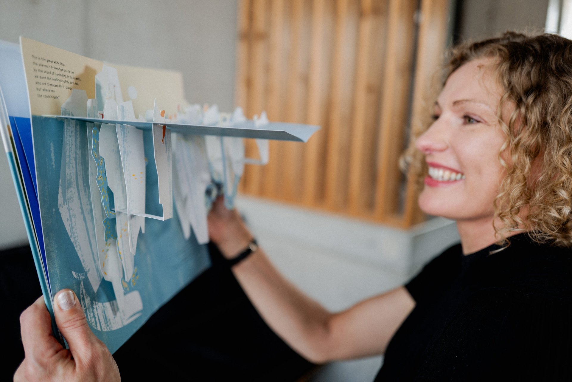 black and brown leather padded tub sofa