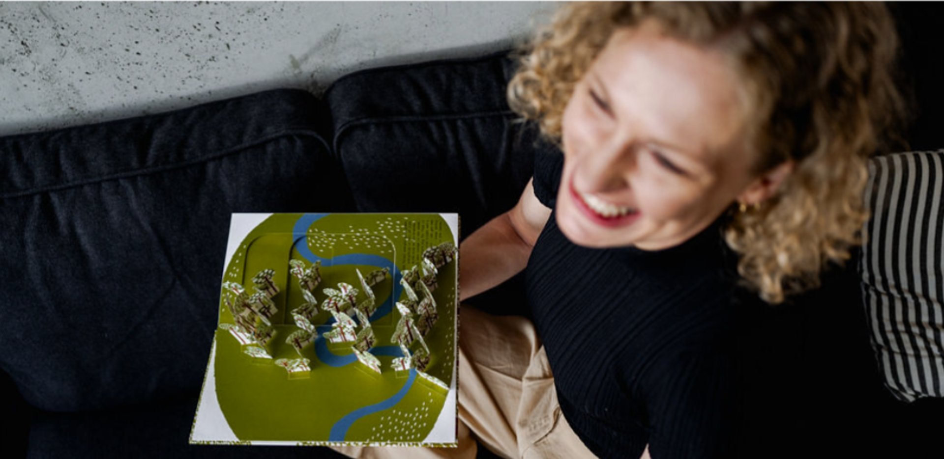 black and brown leather padded tub sofa