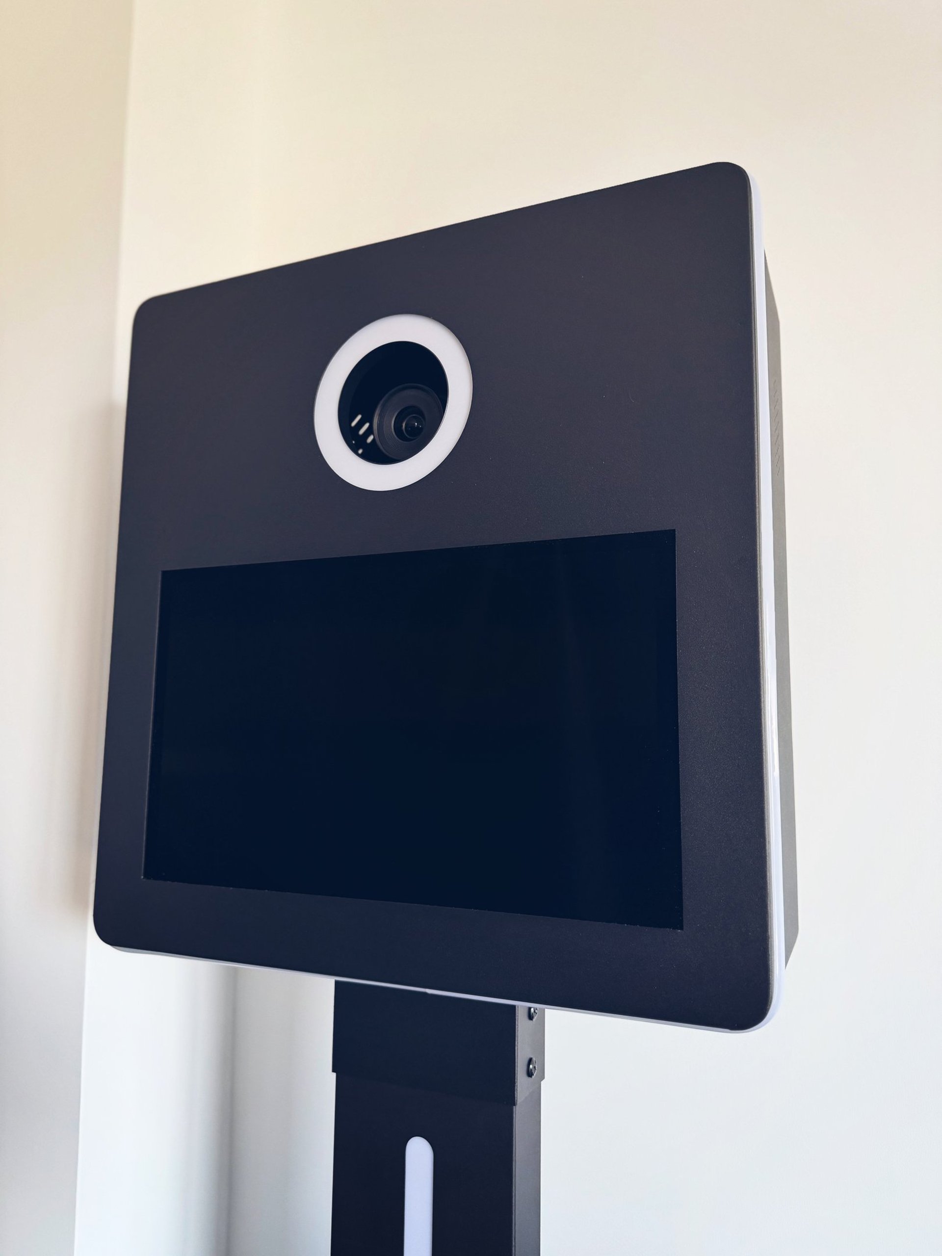 person holding black camera lens