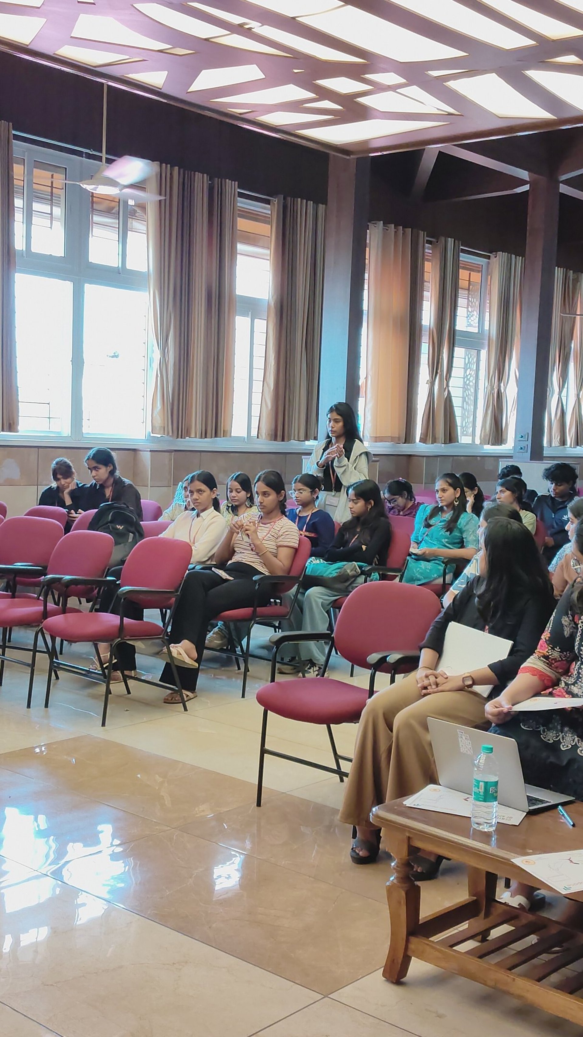 woman wearing yellow long-sleeved dress under white clouds and blue sky during daytime