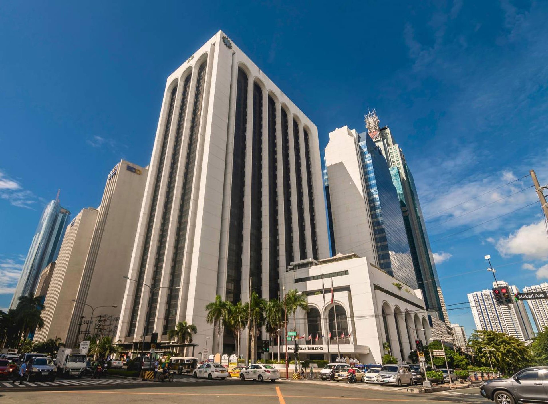 woman in black tank top and black leggings doing yoga
